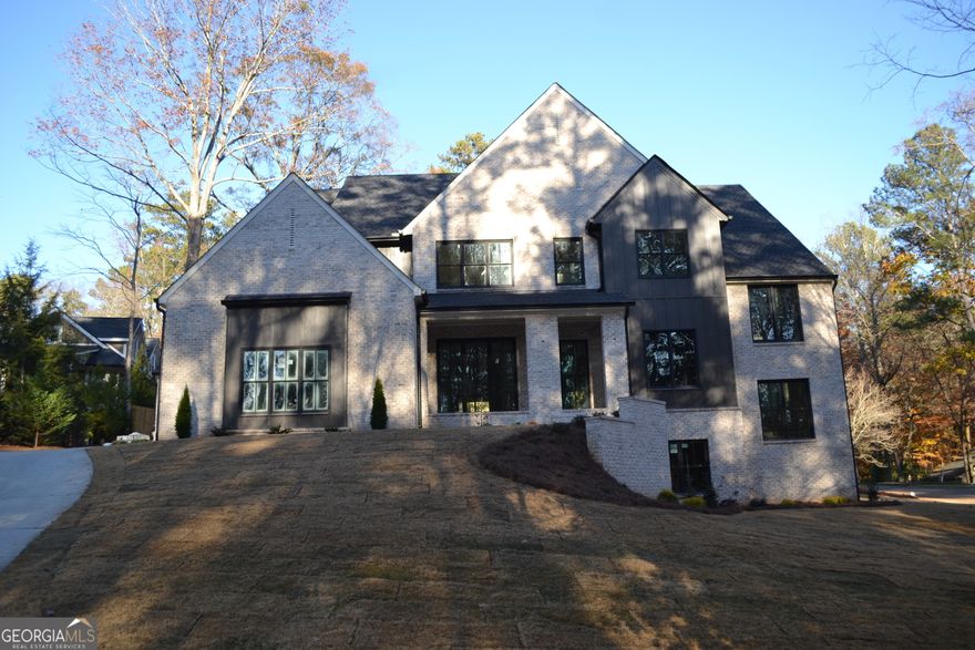 Ready to move in now to a new construction, spectacular home? This is it! 98% complete and ready for late February move in - come on!!!. High end finishes everywhere and the master bath and kitchen are straight out of HGTV. You could be in this brand new dream home now! Another fantastic custom property by Whitestone Builders. Hundreds of enthusiastically satisfied clients over the last 3 decades w/references galore. This plan features 5 BR/5.5 BA w/main level guest bedroom suite and master up as well as a media/flex room. Genuine on-site finished hardwoods upstairs and downstairs so other than tile in the bathrooms and laundry room, there is no carpet anywhere. Lots of square footage and bang for your $$$. Incredible lot w/HUGE backyard will be highly sought after in that there will be plenty of room for a pool - and you are able to walk out directly from the main level onto your yard - no deck (but a superb covered outdoor living room w/fireplace). Located on a cul-de-sac street in the quietest part of the neighborhood. Incredible, full daylight basement offers endless possibilities for now or future expansion w/9' smooth sheet rock ceilings. Site plan also uploaded to Documents. One of THE MOST sought after school triumvirates in the entire southeastern US. Contact us today and start the process towards making this gorgeous home your own! No cookie cutter %$#& 0 this is the reak deak