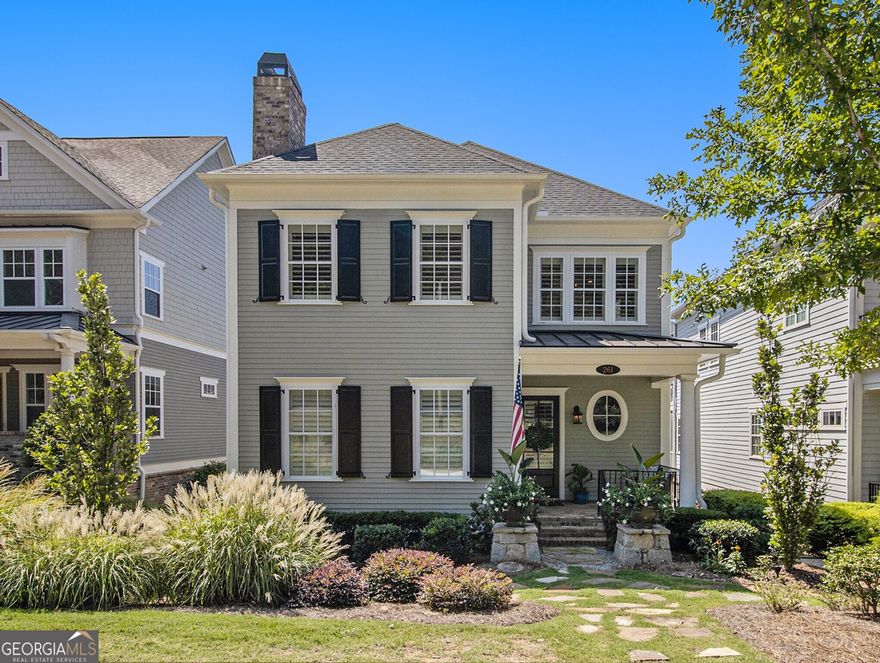 Step into the elegance of this exceptional home in Foundry, where timeless charm and modern splendor greet you at every turn. A quaint front porch with classic brick flooring sets the tone for sophistication. Inside, the open floor plan is bathed in natural light, filtered through plantation shutters and solar blinds. The open-concept dining room flows effortlessly into a state-of-the-art kitchen, featuring an expansive island, Energy Star stainless-steel appliances, quartz countertops, a subway tile backsplash, a custom hood vent, and eye-catching pendant lights-a true chef's dream. The main-level primary suite is a tranquil retreat, complete with a double vanity, quartz countertops, a spacious shower room with multiple shower heads, and a custom walk-in closet. Take the elevator to explore the upper level, where you'll find a versatile loft, two additional bedrooms, and a Jack-and-Jill bathroom. The third floor offers a climate-controlled walk-in storage room for ultimate convenience. On the terrace level, enjoy a cozy living room, another flex space, a bedroom, and a luxurious bathroom with quartz counters and a walk-in shower. A thoughtfully designed mudroom, directly off the garage, adds practical storage solutions. The garage itself is a standout feature, boasting two storage rooms, custom shelving, epoxy floors, and wainscoting. Step outside to the enchanting side patio, complete with pavers, a fire pit, and twinkling lights-perfect for gatherings with family and friends. This home is ideally situated across from Avalon, within walking distance to downtown Alpharetta, and directly connected to The AlphaLoop. Plus, the community pool is an amenity unmatched by neighboring developments. Discover luxury living in a prime location where sophistication and convenience blend effortlessly.
