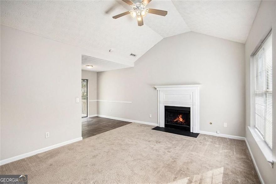 Step into this beautifully maintained home and be welcomed by an inviting living room with soaring vaulted ceilings and an open-concept design that seamlessly connects the kitchen, dining, and living areas, perfect for everyday living and entertaining.  The kitchen comes fully equipped with appliances, including a new gas stove and new refrigerator, plenty of counter space, and a convenient pantry for extra storage. From the kitchen, enjoy open sight-lines into the dining and living rooms, creating a bright and spacious feel throughout.  The primary bedroom is a peaceful retreat, featuring vaulted ceilings and a generous en suite bathroom. Two additional bedrooms and a full guest bathroom are located on the main floor, offering flexibility for family, guests, or a home office.  Outside, the fenced, flat backyard is ideal for kids, pets, or simply relaxing outdoors. It's a perfect space for play, gardening, or entertaining.  Downstairs, you'll find a spacious two-car garage and a large bonus room with an attached laundry closet, great for a playroom, home gym, office, or additional living space.  This adorable home checks all the boxes, don't miss your chance to make it yours!  This property qualifies for up to $12,500 in down payment and closing cost assistance from Move Home Lending.