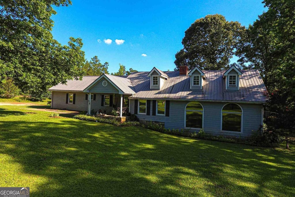 Photo of 571 King Bostick Road, Covington, GA 30016 (MLS # 10852954)