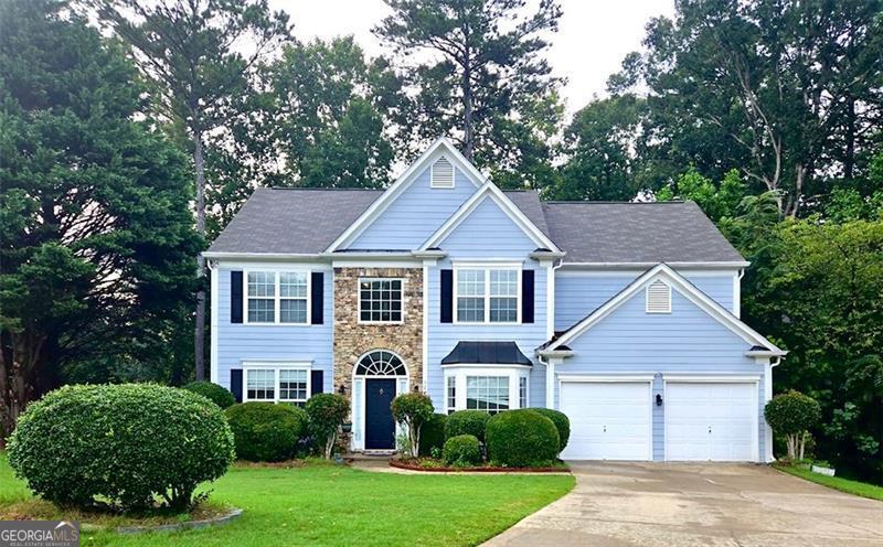 Located in a peaceful CUL-DE-SAC and JUST 3 MINUTE SHORT WALK FROM THE TOP RATED NORTH GWINNETT HIGH SCHOOL, this beautifully updated 4-bedroom, 2.5 bath home offers over 2700 square feet of modern living space in one of Suwanee's most sought-after swim and tennis communities. The home features new LVP flooring on the main level, newly updated kitchen with white cabinetry, 2 story Family Room that looks out to private wooded back yard, built-in bookshelves in a flex space with French doors that can be used as a 5th bedroom or an office, separate formal dining room, lots of natural light pouring into the inviting floor plan, the spacious master suite that offers a serene retreat, generously sized additional bedrooms with ample closet space, and much more! Whether you are relaxing at home or taking advantage of the nearby amenities (Settle Bridge Park, walking trails to the Chattahoochee River, Bear's Best Golf Course, just to name a few) this charming property offers both comfort and convenience in a prime Suwanee location. Don't miss out on this incredible opportunity--schedule your private showing today!