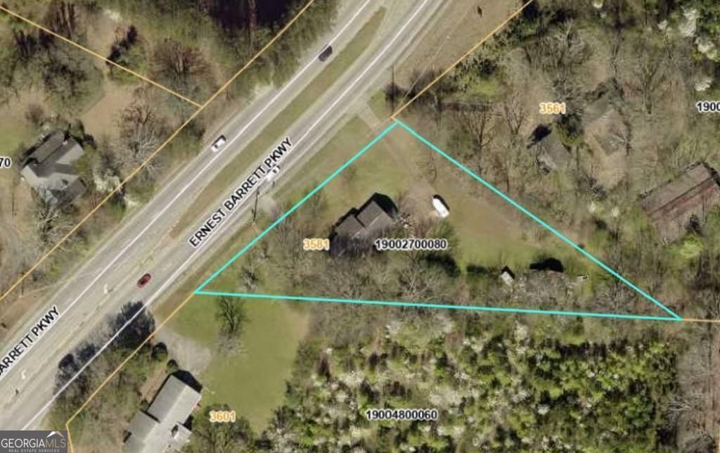 LOOKING FOR THE PERFECT LOCATION FOR YOUR DREAM BUSINESS .. RESTAURANT, DAYCARE, SMALL RETAIL? THIS COULD BE IT!! As a stand-alone property or as a part of an assemblage with the 5 acres next door, this could be a great opportunity to develop your dream. Currently zoned C-4 (Commercial Small Tract). No Sign on this property, there is a sign on the property next door.