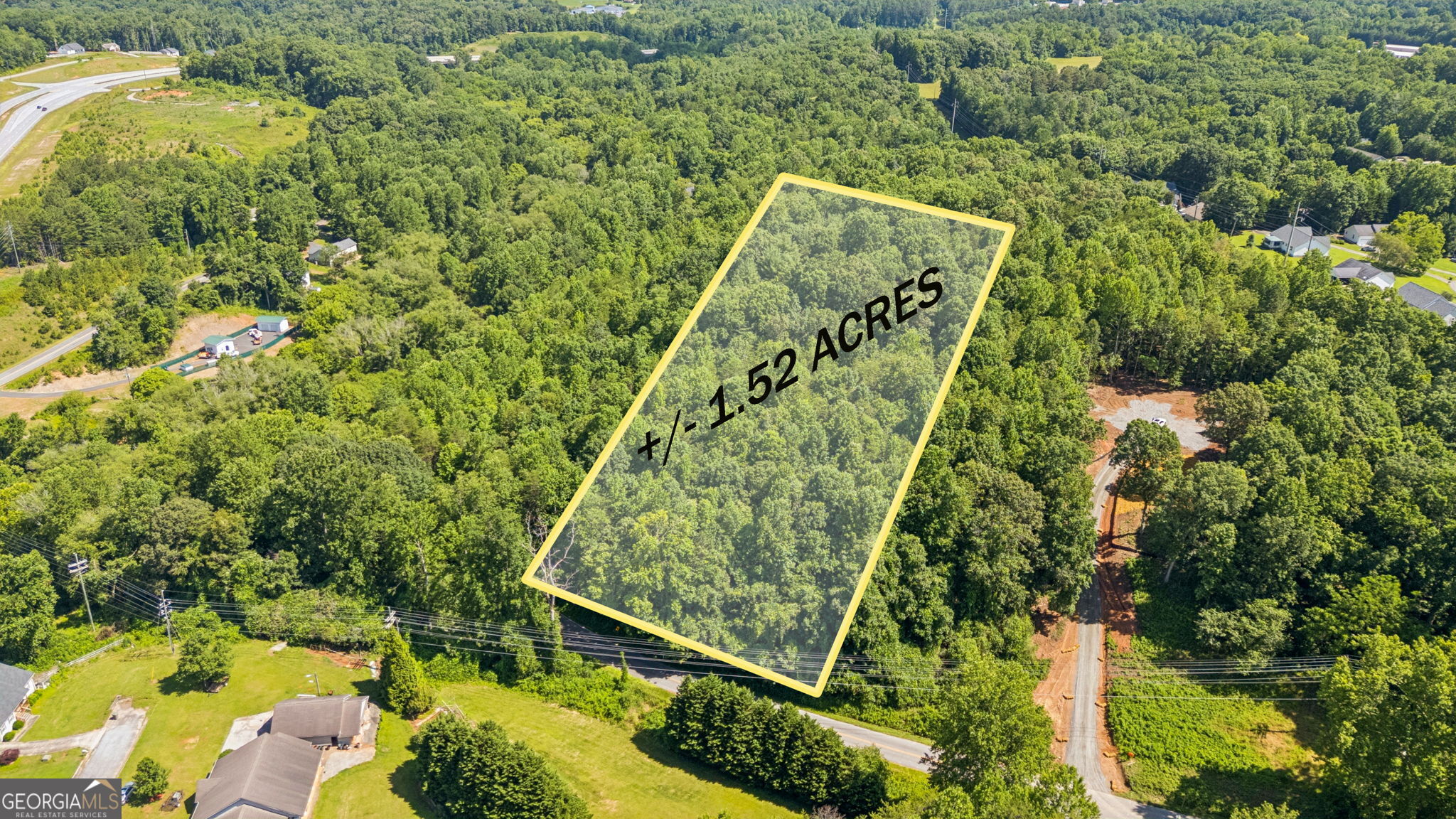 Development-Ready Opportunity: Adjacent parcel is currently under development, signaling strong momentum in the area. This property offers a prime chance to build, following a clear proof of concept for residential development and allowing you to position early in a rapidly growing corridor. Rare 1.52-acre lot in the heart of Cleveland, GA, offering panoramic mountain views, privacy, and utilities-ideal for custom homebuilders or long-term investors. Located within city limits but tucked away in a quiet, elevated setting, this R1-Residential lot features city water, sewer, and power already available-no need for soil testing or septic installation. The land is recently surveyed and recorded, backs up to protected conservation acreage for lasting natural privacy. Located just minutes from J.P. Nix Elementary School, local shops, and dining. With no HOA, a no-mobile-home policy, and zoning that supports future growth, this property offers a rare blend of build-ready convenience and strong investment fundamentals in a steadily developing North Georgia corridor.