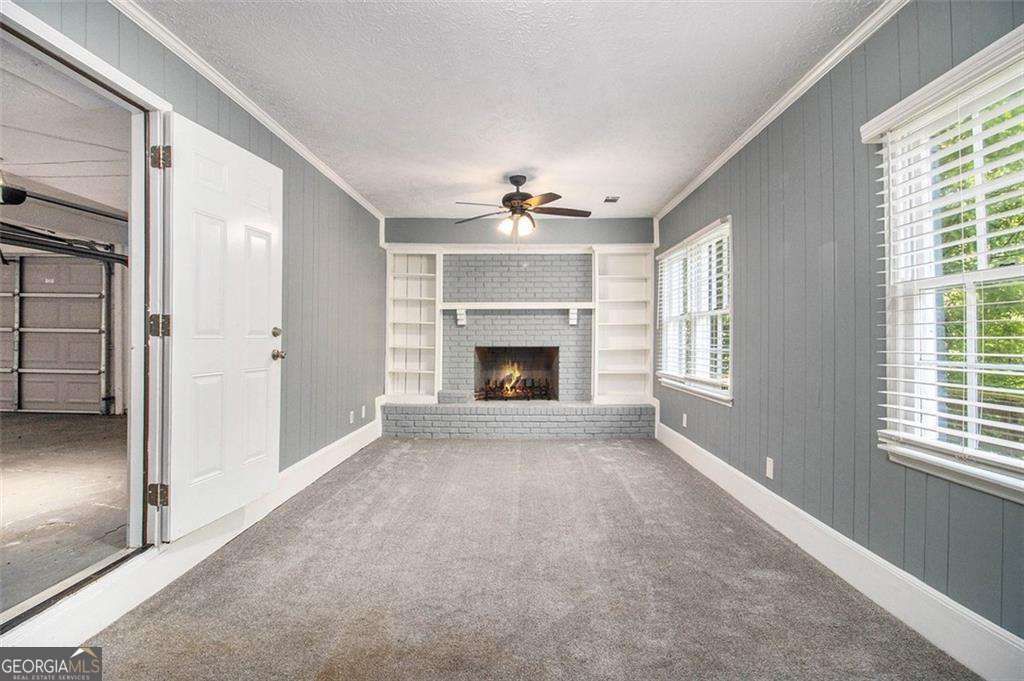 Photo of 5826 Simone Drive, Stone Mountain, GA 30087 (MLS # 10659769)