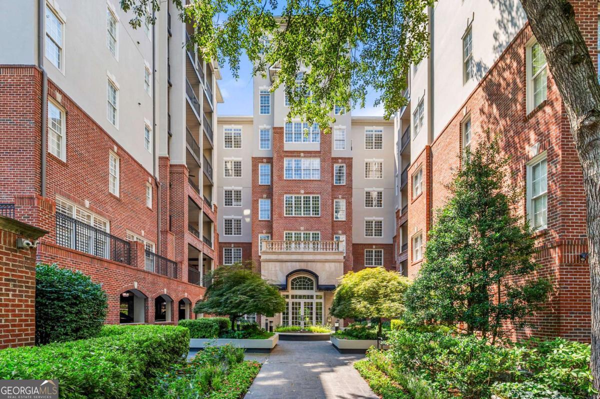 Welcome to your city retreat at The Manor House Unit 2109, a move-in ready condo designed for modern urban living. This freshly updated home offers two spacious bedrooms with large walk-in closets and two sleek bathrooms featuring a double vanity, walk-in shower, and a Japanese-style soaking tub perfect for relaxing after a long day. The open living area includes hardwood floors, nine-foot ceilings, abundant natural light, and a stainless-steel and granite kitchen that overlooks the living space, making it ideal for entertaining or unwinding. Added conveniences include a private laundry room with washer and dryer, brand-new carpet in the bedrooms, two deeded parking spaces (#51 & #156) in a secure garage, a 24-hour concierge for peace of mind, and even a dog walk for your furry friend. Located on a tree-lined street that feels like a neighborhood but sits just minutes from the Beltline, Bobby Jones Golf Course, shopping, and dining, this condo blends comfort, style, and city convenience between Buckhead and Midtown. Don't miss your chance to experience true urban elegance-schedule your tour today to see this beautifully renovated and staged home!