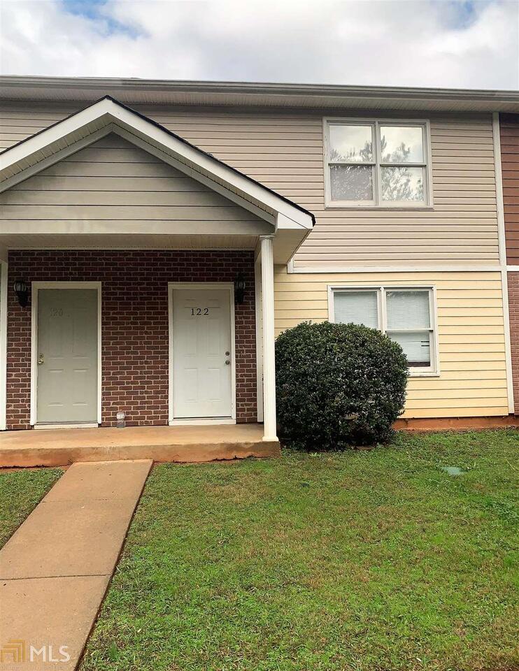 Charming, well kept 2 bedroom, 2.5 bath town home in Stockbridge! This two story town home includes a spacious family room with a separate breakfast area that overlooks backyard and patio! Each spacious bedroom which are located upstairs have their own bath with nice size walk-in closets. Laundry room and half bath are located on the first floor. Tile throughout first floor and hardwoods upstairs. Very close to I-75, shopping and restaurants! Great starter home or for first time home buyers!