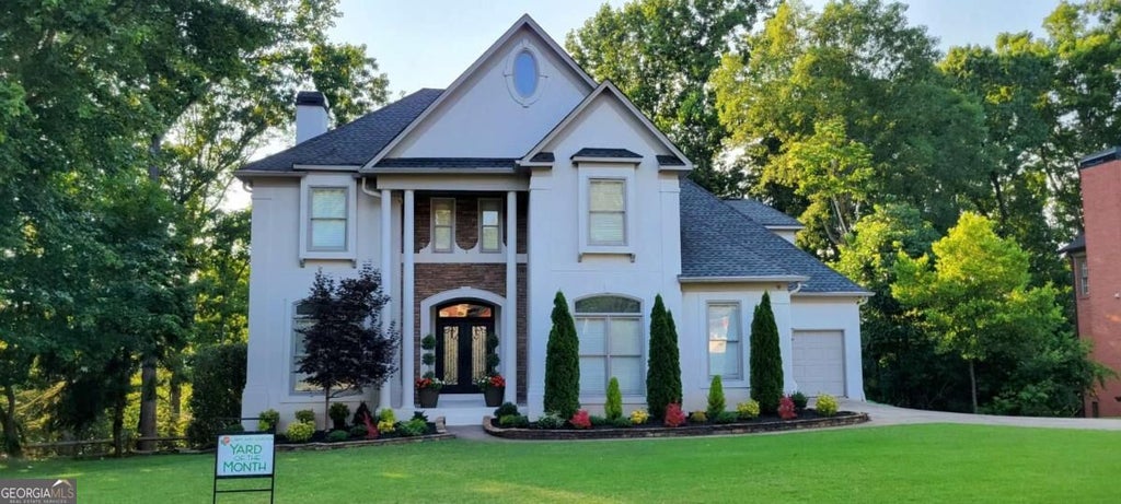 Photo of 5925 Masters Club Drive, Suwanee, GA 30024 (MLS # 10877680)