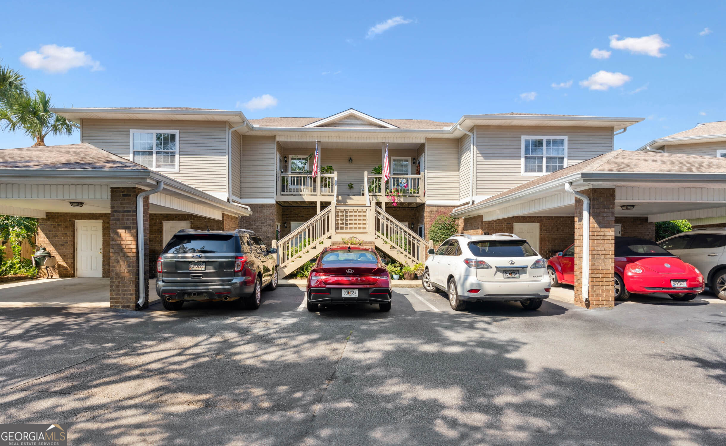 Welcome to 103 Kings Marsh Villa, a beautifully updated 3-bedroom, 3-bath condo ideally located in the heart of St. Simons Island. This spacious, single-level flat offers serene marsh views, covered parking, and access to a community pool-all within walking distance to popular restaurants and shopping. The open floor plan features a generous kitchen with bar seating that flows seamlessly into the dining and living areas. The living room is anchored by a cozy fireplace with built-in shelving and opens to a screened porch overlooking the marsh-perfect for relaxing or entertaining. Each bedroom is generously sized with ample closet space. The primary suite is a standout, showcasing a fully renovated bathroom and a custom walk-in closet. Additional conveniences include a private storage unit in the carport, ideal for bikes and beach gear. Tucked away for privacy yet close to everything, this move-in-ready condo offers the best of island living. Don't miss the opportunity to make it yours!