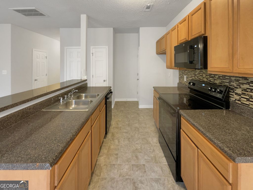 Photo of 4944 Wexford Trail, South Fulton, GA 30349 (MLS # 10671468)