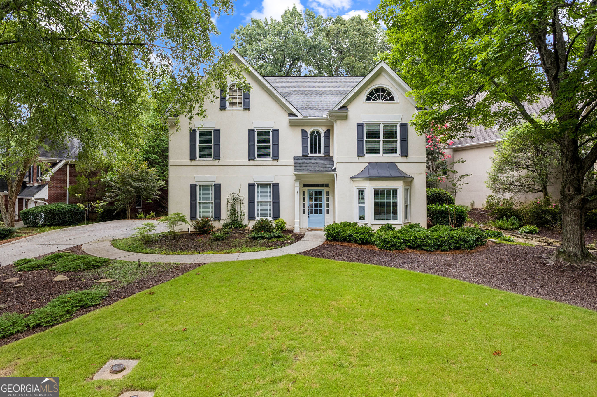 Rare opportunity to lease a home in the desirable Orchard Gate community-featuring a highly sought-after floor plan with a bedroom and full bath on the main level! This spacious layout is perfect for entertaining, offering an oversized formal dining room, a large fireside family room, an updated eat-in kitchen, and a bright keeping room. The main-level guest suite can also be used as an office, formal living room, or flex space. A full laundry room with built-in cabinetry is also conveniently located on the main floor. Originally the builder's model home, it boasts beautiful hardwood floors throughout the main level, extra crown molding, and custom built-in bookcases in the family room. Upstairs, the oversized primary suite includes a walk-in closet with built-ins, an additional cedar closet, a soaking tub, separate shower, and new granite countertops. Two additional bedrooms share a Jack-and-Jill bath with a double vanity and upgraded granite as well. The level, extra-wide lot offers ample guest parking and a private backyard with a picturesque patio off the keeping room-ideal for outdoor dining or relaxation. Minutes from I-285, Vinings, Smyrna Market Village, Truist Park, and top dining like Canoe and West Village-this is a rare rental opportunity in one of Cobb's most charming communities! With easy access to The Battery, Smyrna Village, Vinings Jubilee, Parks, Retail, and Major Highways, this home combines peaceful suburban living with unbeatable city convenience. Don't miss the opportunity to call this beautiful home yours! This property is also listed for sale!Contact Lee Anne 404-441-0998 for sale information only!