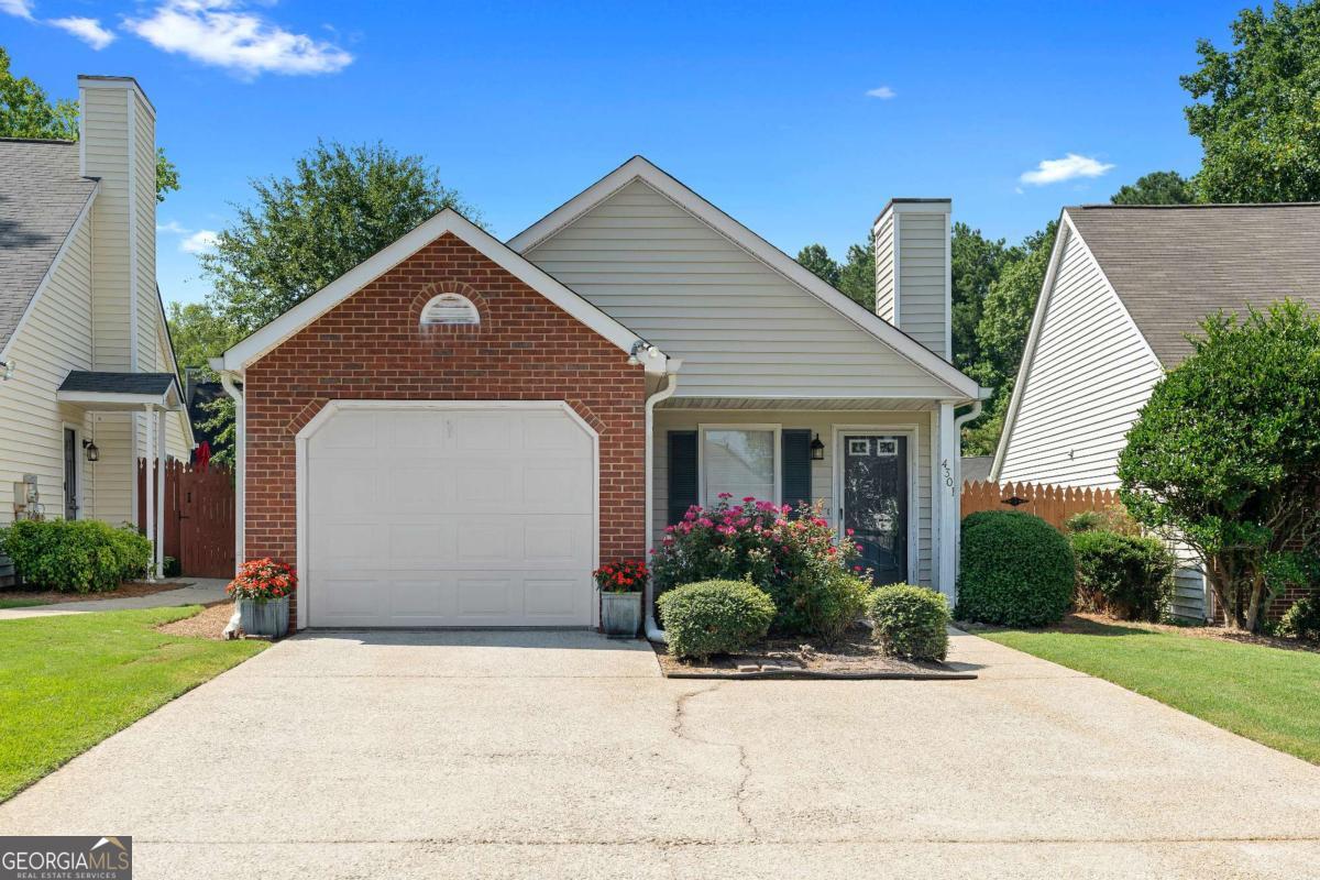 Welcome to this charming 2-bedroom, 2-bathroom home! Step inside to find a bright, open layout with vaulted ceilings, stylish flooring, and a spacious living and dining area ideal for both relaxing and entertaining. The kitchen features granite countertops, a breakfast bar, and stainless steel appliances, making meal prep a breeze. Both bedrooms are generously sized, and the bathrooms are tastefully completed with modern finishes. Enjoy the outdoors in the large, fully fenced backyard with a private patio-perfect for grilling, lounging, or hosting guests. With a one-car garage, fresh landscaping, and great curb appeal, this home checks all the boxes. Don't miss your chance to own this move-in ready gem!