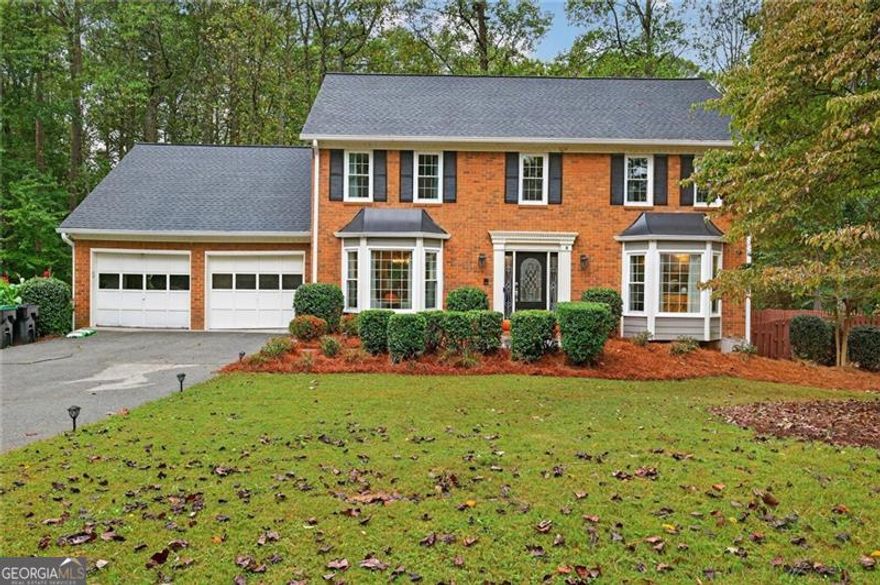 WELCOME HOME to Prime East Cobb, Marietta. PRICED TO SELL, MOTIVATED SELLER.  Located in the highly sought-after 30062 zip code within the award-winning Pope High School district, this stunning 5-bedroom, 2.5-bath home plus huge unfinished basement, is nestled in the family-friendly Chimney Springs community-renowned for its lifestyle amenities and natural beauty.   Community Features: Residents enjoy a scenic lake with fishing, jogging and biking trails, basketball court, three mini parks, cul-de-sac islands, greenbelt areas, eight lighted tennis and pickleball courts, a brand-new playground, a beautiful clubhouse and a year-round social events that create a true sense of community and belonging -all for an HOA fee of just $850/year.  The Home: Offering ideal indoor-outdoor living, the spacious floor plan features a cozy den with fireplace, a sun-filled sitting area (3343 sq ft finished) and a large unfinished basement (1212 sq ft unfinished but HVAC ventilated) ready for expansion. The 3-sided brick exterior and generous fenced backyard frame your own private retreat-complete with a HEATED INGROUND POOL and brand-new equipment package (heater, filter, etc.) so you can enjoy year-round swimming.  Luxury Renovations: The current owners have invested approximately $260,000 in upgrades as follows: *Full Kitchen gut and remodel - all New, high end appliances, wetbar/prep sink, and sitting area ($120k); *Powder Bathroom - added molding and ventilation ($10k); *New High End LVP Flooring ($7k); *New White Oak Main Staircase ($5k); *Master Bath gut and renovation ($25k); *Guest Bath renovation ($5k); *Backyard Renovation - demo and replaced all retention walls, new planting beds, new water runoff piping, new dry creek bed ($30k); *New carpeting in guest beds and playroom over garage ($3k); *New high end Pella windows ($31k); *New Gutters ($8k); *Ring Security Camera and Lighting System ($1k); *New Paint, Lighting, Touch ups ($1k); Brand New Pool Equipment, Pool Cover, and Gas Line ($17k) TOTAL $263K.  *ROOF is under 2 years old.  ADDITIONALLY, Highlights include:   * Chef's Kitchen: Soapstone perimeter countertops, a dramatic 9-ft opal marquette quartz island with waterfall edge, Zellige tile backsplash with under-cabinet lighting, appliance garage with hidden outlets, and elegant pinch-pleat curtains framing bay windows overlooking the pool.   * Wet Bar Area: Generously sized prep sink, appliance garage, and hidden electrical to keep counters clear.   * Owner's Suite Spa Bath: "Organic modern meets timeless elegance" with a freestanding soaking tub, designer fixtures, classic checkered tile, and cabinet-to-ceiling mirrors that bring spa-level grandeur into your daily routine.  Transferable home warranty available.  With mixed emotions, the sellers are saying goodbye to their forever home as a remarkable job promotion has opened new doors for them out of state. This home is also just a short drive to the historic Roswell and Canton Street area, where you can enjoy the best restaurants, boutiques and entertainment. Hurry!  This one won't last.