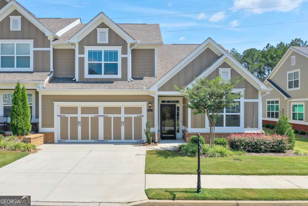 Welcome to The Orchards of Central Park, a sought-after 55+ active adult community in Cumming offering low-maintenance living in a prime location. This popular Cypress plan features 3 bedrooms and 3 full bathrooms, thoughtfully designed with comfort and style in mind. Enjoy hardwood floors, stainless steel appliances, and a beautiful rear screened porch with an adjoining patio, perfect for relaxing or entertaining. The upstairs includes a versatile additional room that can be used as a home office, media space, or guest retreat. Residents enjoy resort-style amenities at the grand clubhouse, including a saltwater pool, fitness center, and elegant gathering spaces. The community backs directly to Central Park, offering scenic beauty and outdoor recreation right at your doorstep. This home is the perfect blend of convenience, community, and charm.