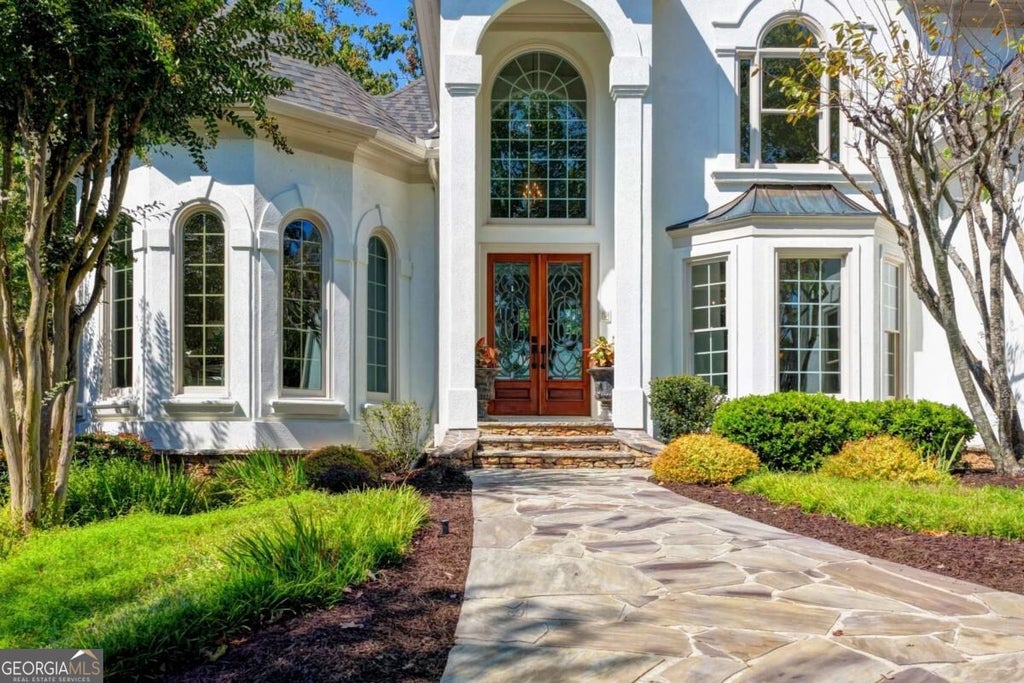 Photo of 7060 Redcliff Court, Suwanee, GA 30024 (MLS # 10852871)