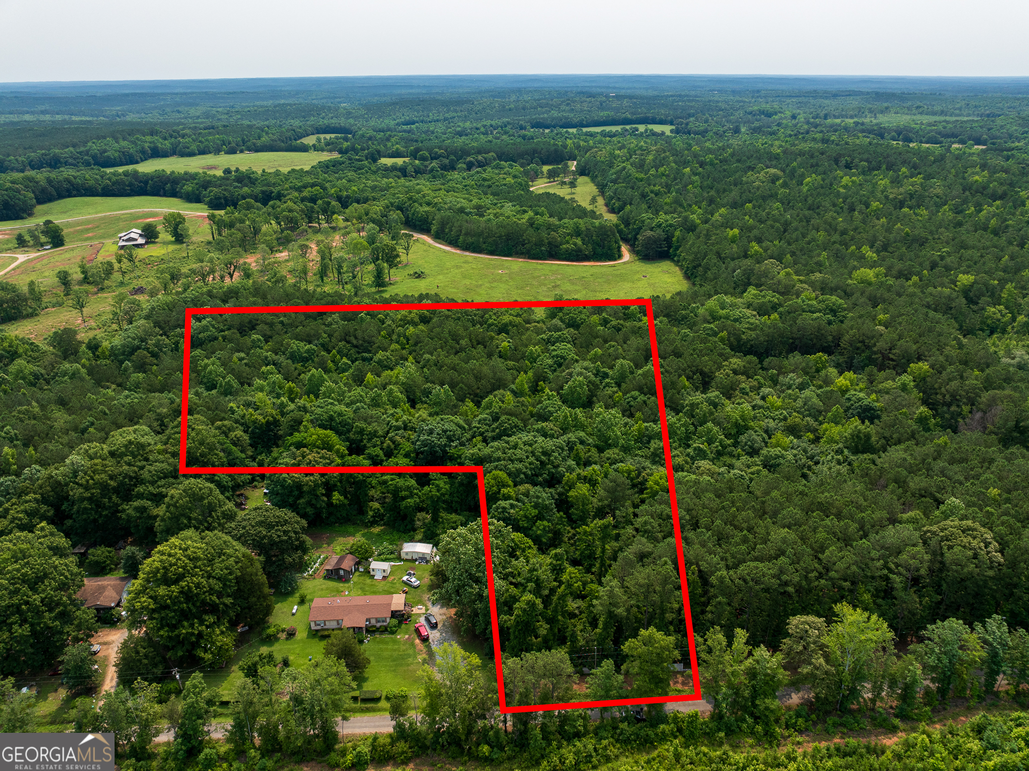 Welcome to 963 Blue Ridge School Road Forsyth, Monroe County, Georgia! Gorgeous 3.85 acres residential lot located at 963 Blue Ridge School Road, Forsyth, North Monroe County, Georgia. Small stream towards back of the property. This wooded lot offers paved road frontage and NO HOA!!! Electricity available along Blue Ridge School Road, this area of north Monroe County will be serviced by septic and well. The lot is not located in a floodplain. Plat on file.