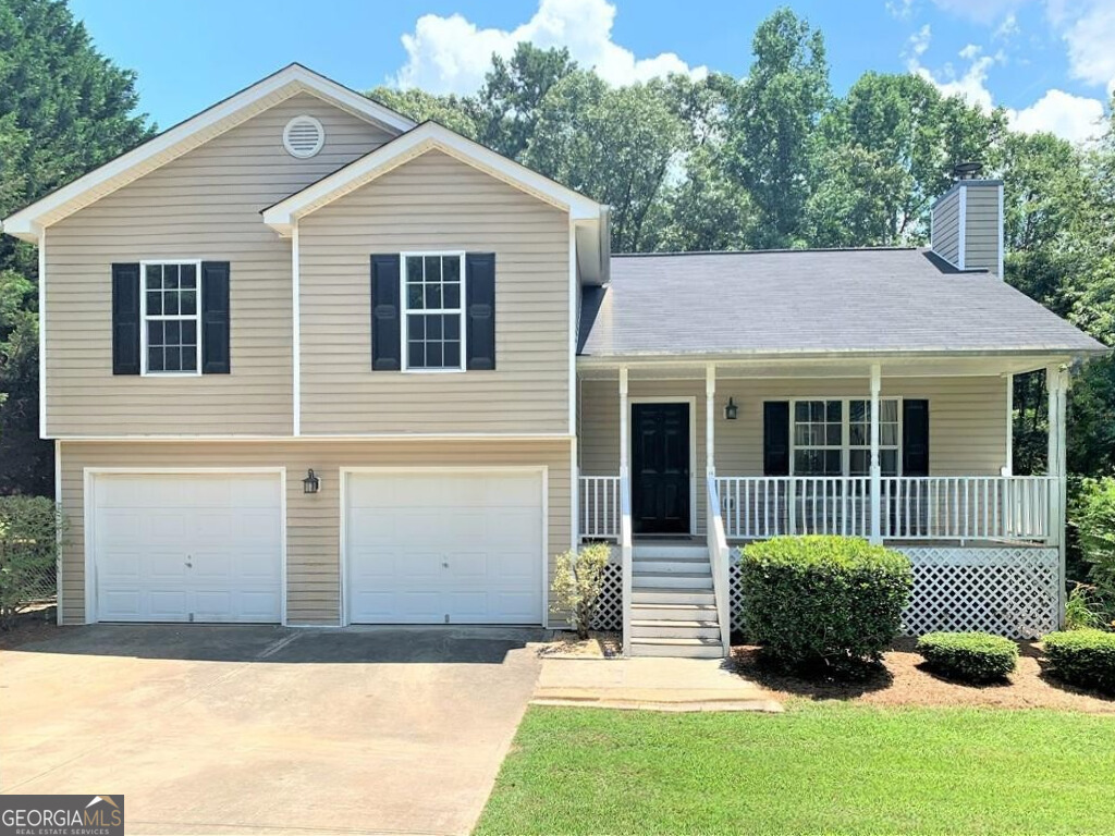 Welcome to 2827 James Henry Drive - a charming split-level home on 1.14 acres with NO HOA in Dacula! This move-in ready home offers 3 bedrooms and 2 full baths upstairs, plus a FINISHED lower-level room ideal for guests, an office, or a playroom and its own private backyard entrance. Fresh interior paint throughout. The eat-in kitchen features granite countertops, white cabinets, and stainless steel appliances, with morning coffee best enjoyed on the back deck with a view of beautiful mature trees that helps maintain privacy. Conveniently located just 7 minutes from the future Dacula City Core, a vibrant new development with an open-air amphitheater, greenspace, and dining/retail opportunities coming soon. This home has the space, convenience, and investment potential ready for a first time home buyer or investor. No rental restrictions. Easy access to Hwy 316 and I-85 adds even more appeal. Ready to call this your home? Reach out for a private showing today!