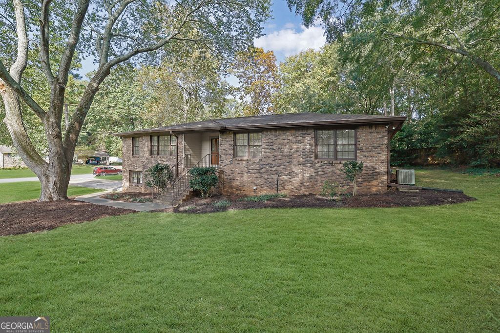 Photo of 905 Tanglewood Trail, Woodstock, GA 30189 (MLS # 10630522)