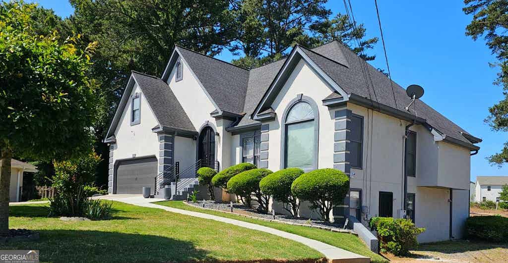 Photo of 2461 Highland Golf Course Drive SE, Conyers, GA 30013 (MLS # 10785910)
