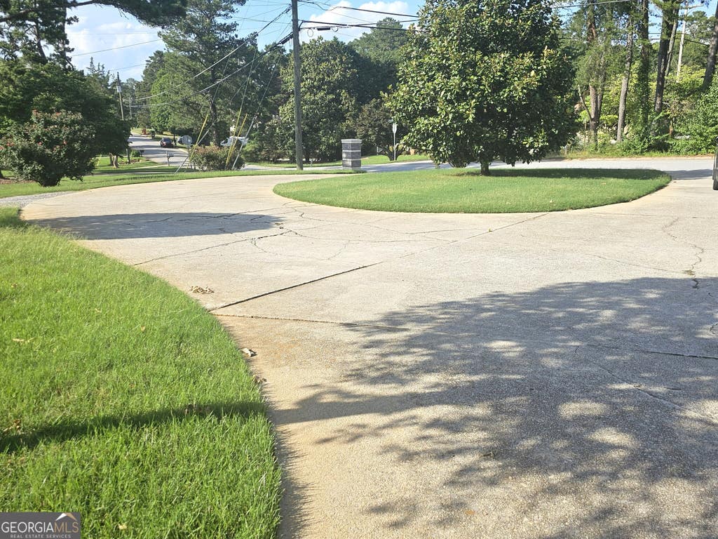 Photo of 2461 Highland Golf Course Drive SE, Conyers, GA 30013 (MLS # 10785910)
