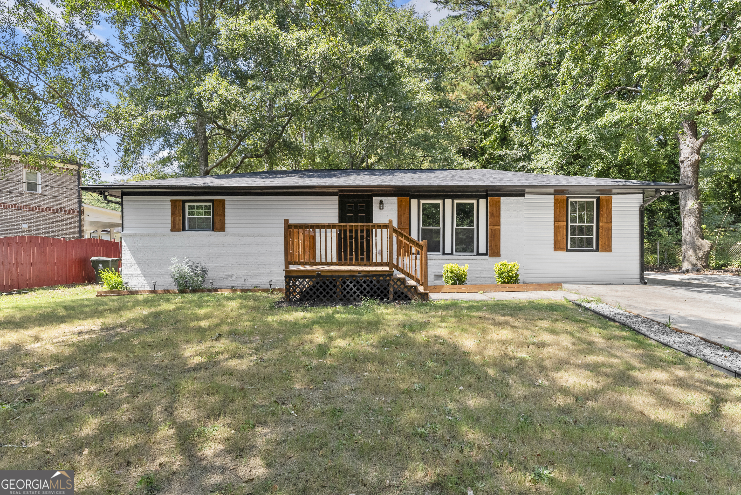 Welcome to 1958 Judy Circle SE in Marietta-an updated 4 bed, 2 bath home with ~1,200 sq ft and nearly everything new. The heart of the home is an open kitchen/living area that flows easily for everyday life and entertaining. The brand-new kitchen features granite countertops, fresh cabinetry, and modern finishes. Both bathrooms are fully renovated with tiled showers, and beautiful hardwood floors run throughout the home for a cohesive, low-maintenance look. Smart split layout: the primary bedroom sits on its own side with a private side entry, while three additional bedrooms are grouped on the opposite side for extra privacy. Fresh, clean, and turnkey-just move in and enjoy.