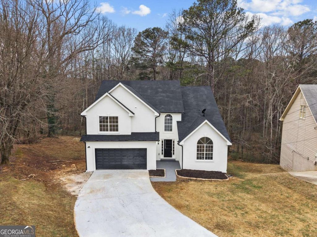 Photo of 5020 Panola Mill Dr, Lithonia, GA 30038 (MLS # 10682898)