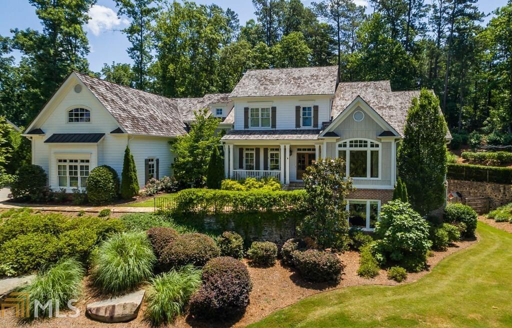 Exquisite living in Milton's sought after Six Hills subdivision. All custom interior features and nicely elevated lot with private 1.6 ac. 4 fireplaces throughout, large bedrooms each with en suite baths, custom design formal study, elegant outdoor living area w/cooking station. Cathedral pine ceilings & wide-plank pine floors, to-die-for chef's kitchen with accented stone walls and elegantly designed light fixtures. Magnificent finished terrace level with kitch, living, media/workout, full bed/bth, & wine room. Walk to downtown Crabapple & best schools in area!