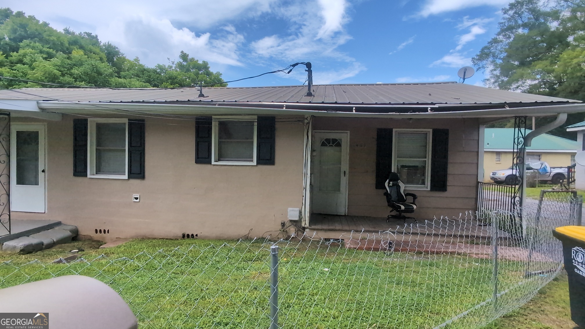 Come check out this wonderful home that boasts it's own huge workshop outback to add even more space for you to move around in! This 3-bedroom, 1.5-bath home has an open concept living/dining room space and a great eat-in kitchen with newly installed LVP flooring. Hardwoods throughout the bedrooms, LVP in the kitchen, and tile in the living room keep the home nice and easy to clean. The property includes a spacious workshop, a large storage shed, and a 2 car aluminum carport. Prime location just minutes from the vibrant heart of downtown Rome, schools, parks, and local amenities.
