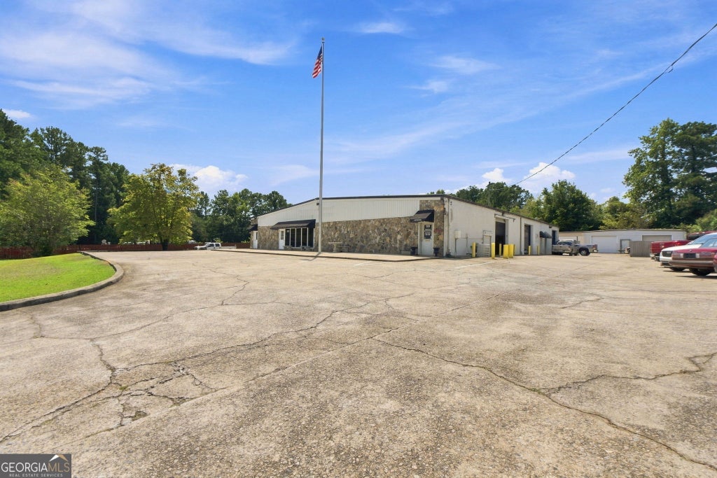 Photo of 120 Walker Pkwy, Fayetteville, GA 30214 (MLS # 10835584)