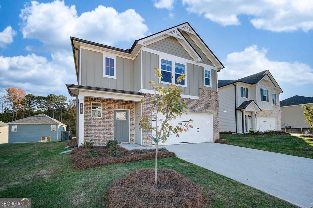 Photo of 327 Abbotts Crossing Circle, Conyers, GA 30094 (MLS # 10790474)