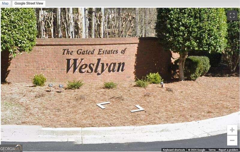 Impressive lot in Exclusive Gated Community. Beautiful 2.212 acre wooded lot with community pond - Subdivision holds Executive Style Homes & Shared Lake/Pond on the back of the property. *NO SIGNS*