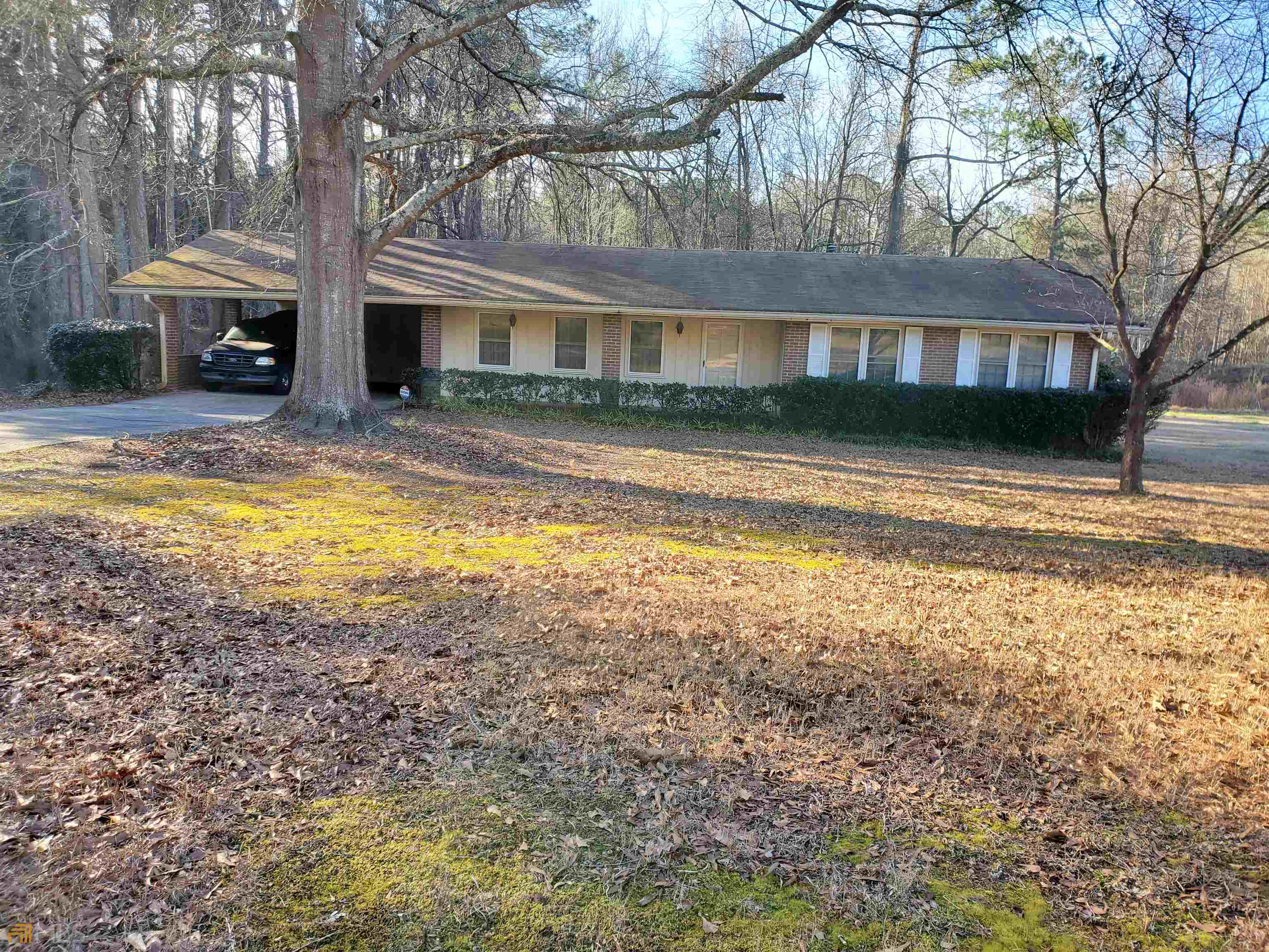 Pristine condition on this one owner home in South Fulton county. 3 Bedroom 2 Bath ranch home with great accessibility features such as grip features in the bathrooms and an accessible entrance at the carport door. Built in sun-room with a bar, separate Dining/Living room area and Laundry room- this home has all the features of a well laid out space. Home also has upgraded sound proofing and windows provided as apart of a Hartsfield Jackson International Airport runway extension.