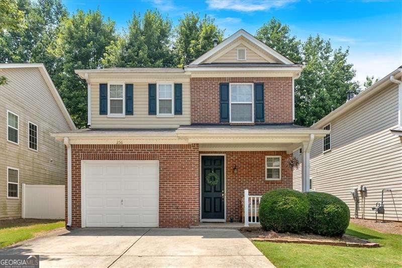Come check out this adorable, well maintained 2 bed 2 and a half bath home in the quickly growing Holly Springs/Canton area! It's move-in ready with updated LVP flooring on the main floor, a freshly renovated kitchen featuring chic brand new Samsung bespoke white glass smart appliances, granite countertops, new backsplash, open shelving and fun wall paper for a modern touch. Upstairs, the large primary bedroom has two closets giving you plenty of space for storage, a secondary bedroom and a flexible loft area that works great as a home office, playroom, or extra hangout spot. The HVAC is only 2 years old so you'll stay comfy all year long. Out back, enjoy your own private yard-perfect for grilling, gardening, or just relaxing. Enjoy great community amenities including two neighborhood pools, tennis courts, a playground and you're about a 15 walk to Holly Mill recreation area. Need to grab dinner or run errands? You're only a few minute drive from restaurants, Publix and super easy access to 575. HOA covers front yard lawn care and allows rentals that are a minimum of one year lease making it a great purchase for the savvy investor as well!! Square footage may be smaller than actual size