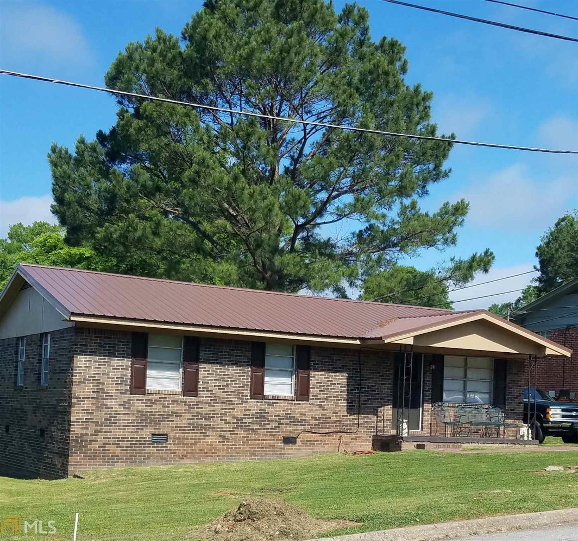 This brick ranch was recently renovated and includes new roof, HVAC, carpet/linoleum, light fixtures, plumbing and freshly painted interior/exterior. 3 bedrooms and 1 bath, living room, kitchen with dining area and separate laundry. Good investment property. Home is currently rented and requires 24 hr notice to show. Property is being sold "as-is".