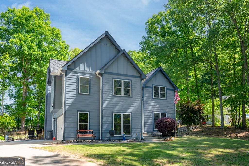 Photo of 95 Tyler Woods Drive, Sharpsburg, GA 30277 (MLS # 10810836)