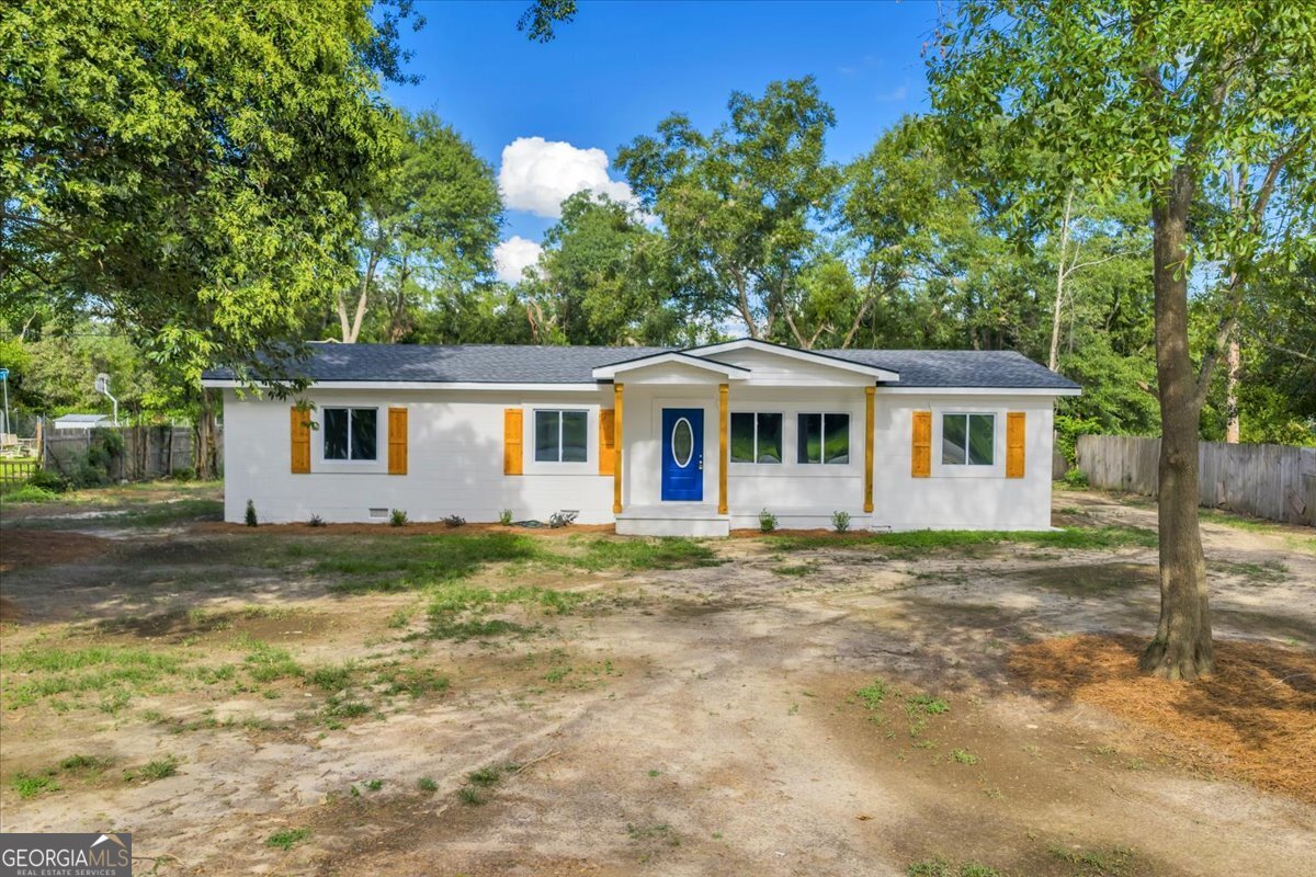 Beautifully Renovated Ranch Off Stonewall Street! This stunning ranch home has been completely renovated and now features an open, split floor plan with 4 bedrooms and 3 baths. The impressive owner's suite boasts a huge walk-in closet and a spa-like bath with a large tiled shower and soaking tub. Enjoy a private porch just off the owner's suite, overlooking the spacious and private backyard. The kitchen, open to both the great room and formal dining room, offers granite counters and will include a stainless steel range and microwave that will be installed prior to closing. Three additional generously sized bedrooms provide plenty of space for family or guests. Outside, a rear patio is perfect for entertaining or relaxing.