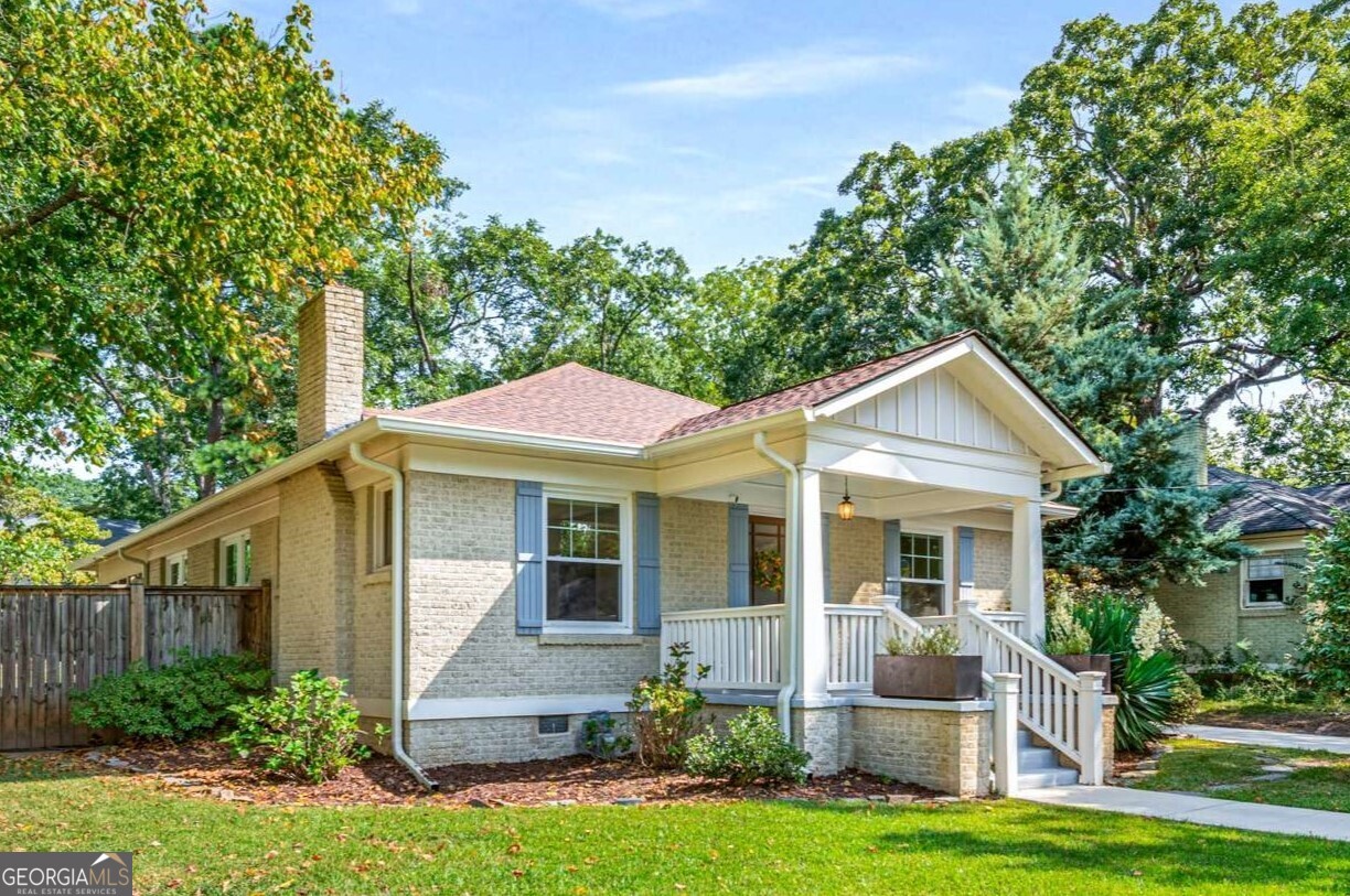 This 3-bedroom, 2-bath brick bungalow blends timeless character with modern updates. Original hardwood floors and charming details reflect the home's 1940s heritage, while newer windows with custom shades and closet shelving systems add everyday convenience. The renovated kitchen features quartz countertops, subway tile backsplash, and stainless steel appliances, opening to a spacious dining room with detailed millwork. The primary suite includes a walk-in closet and spa-inspired bath, with French doors leading to a screened porch-an ideal retreat for morning coffee or evening relaxation. The fenced backyard offers privacy, mature landscaping, and a storage shed, making it perfect for gatherings and play. Recent upgrades include a new roof (2022), new HVAC (April 2025), energy-efficient LED lighting, and foam attic insulation. Historic College Park offers the best of both worlds: small-town charm with city convenience. Neighbors gather for festivals and community events, and residents enjoy nearby parks, recreation facilities, golf, and pickleball. The home is also minutes from Main Street dining, Woodward Academy, MARTA, Hartsfield-Jackson International Airport, Porsche Experience Center, Delta HQ, and major highways.