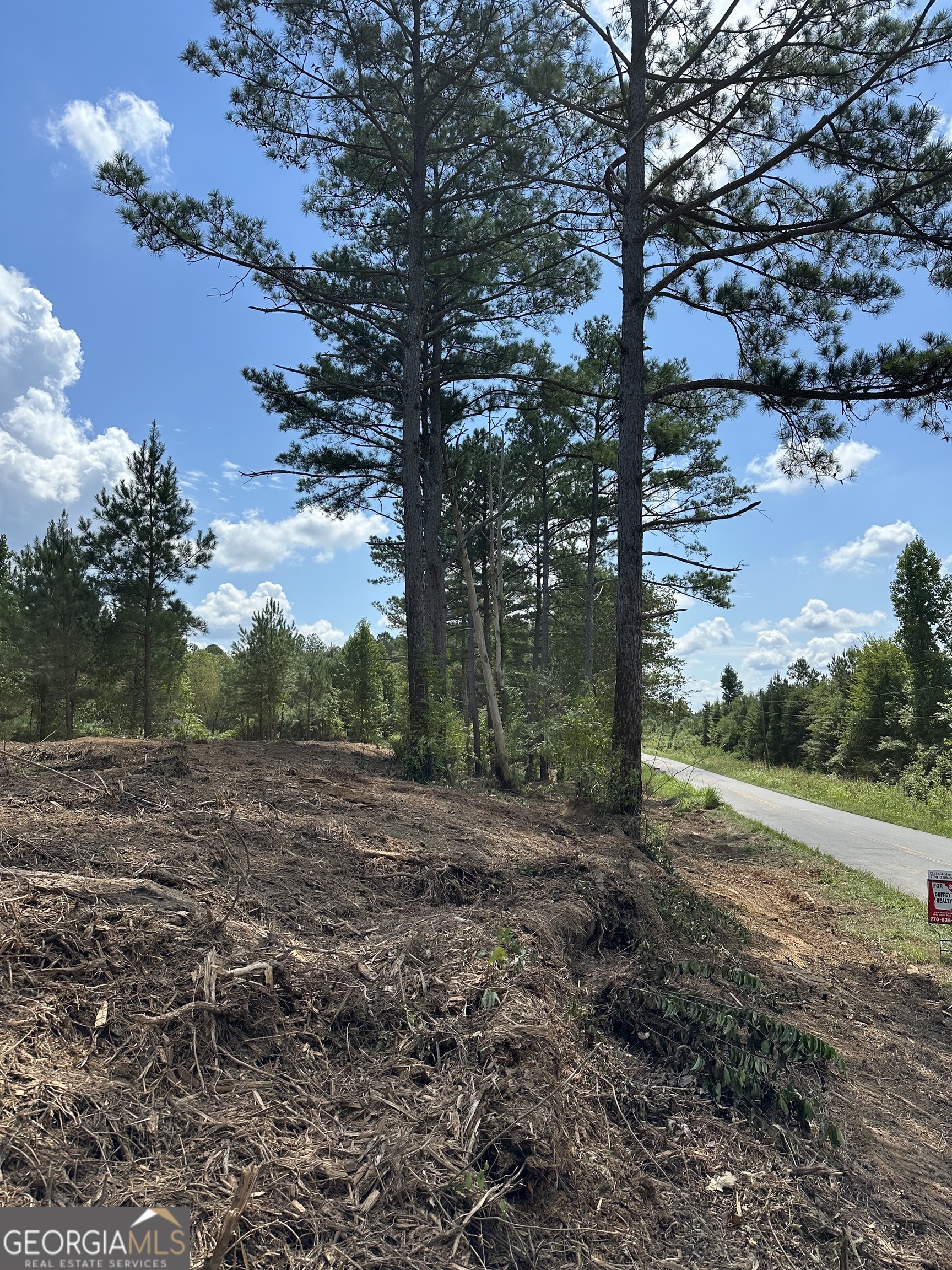 5.61 wooded acres of land. Has 200' of paved road frontage. This property has a driveway cut into the property from the road and County Water is along Culp Lake Rd. The front portion of the land is level and the back side of the property elevates up for nice views and could make a great location for a home. Zoned to allow a site built home or a manufactured home. This property is only a short drive to the Treat Mountain WMA that consist of 7,260 acres for outdoors lovers can enjoy the great outdoors. There is also an additional 5.01 acres beside this tract that can be purchased to total 10.62 acres together.