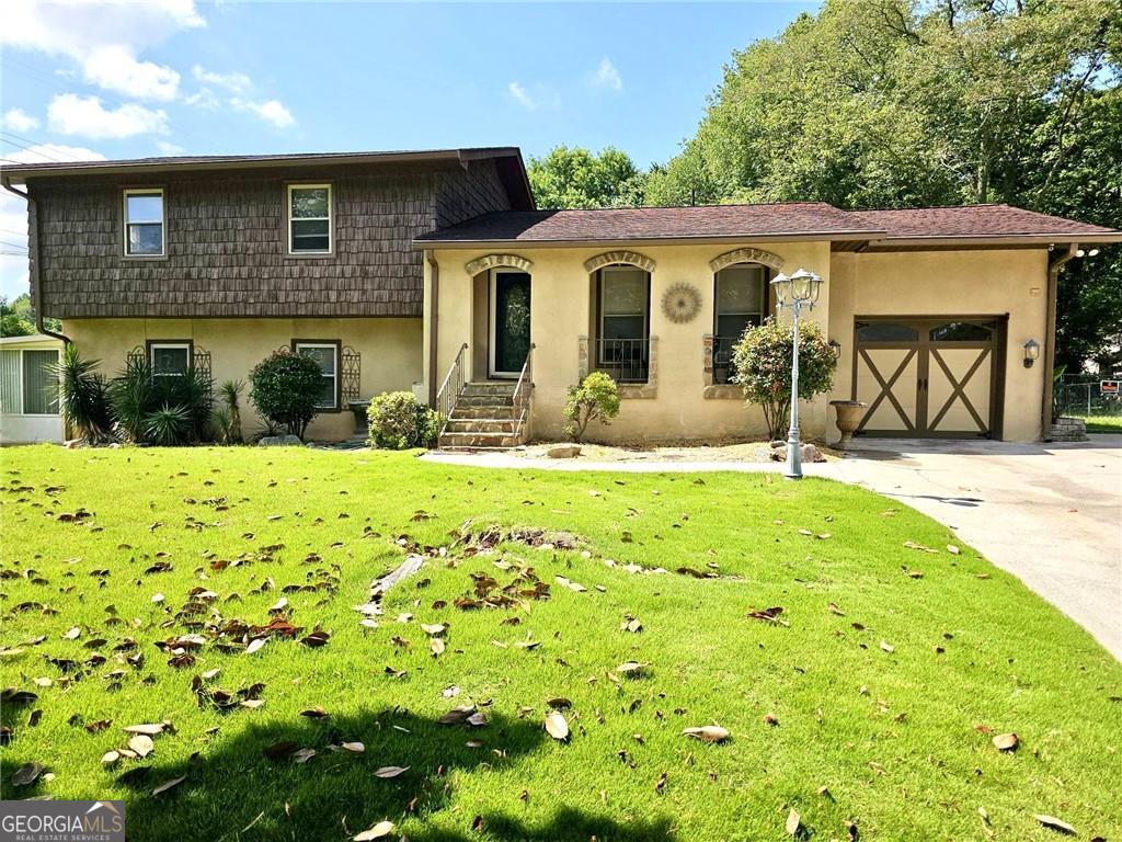 This unique entertaining house sits on a quiet dead end street. It has 4 bedrooms and 3 bathrooms and two separate sunrooms. Both sunrooms face the swimming pool and the man made creek on the back yard. Each sunroom has its own hvac system. The lower level bedroom has a small bar with a mini fridge and direct access to the second sunroom leading to the swimming pool. The house has been renovated and it features a beautiful back yard with a salt water heated swimming pool, custom made outdoor grill gazebo, and another screened gazebo to relax. The house also has tankless water heater, new hvac system, recently replaced roof, all new FVL floors, central vacuum, foam insulated attic, new windows, white kitchen cabinets with white marble and built in Sub-zero fridge. It also has two sheds one that has a big work bench for a handy man. It it equipped with an hvac system. All property in fenced. There is no seller's disclosure as seller has never lived on the property. This is a flip. Listing agent is a principal for the entity that owns the property and will sign on its behalf. Closing with Weissman Law firm.
