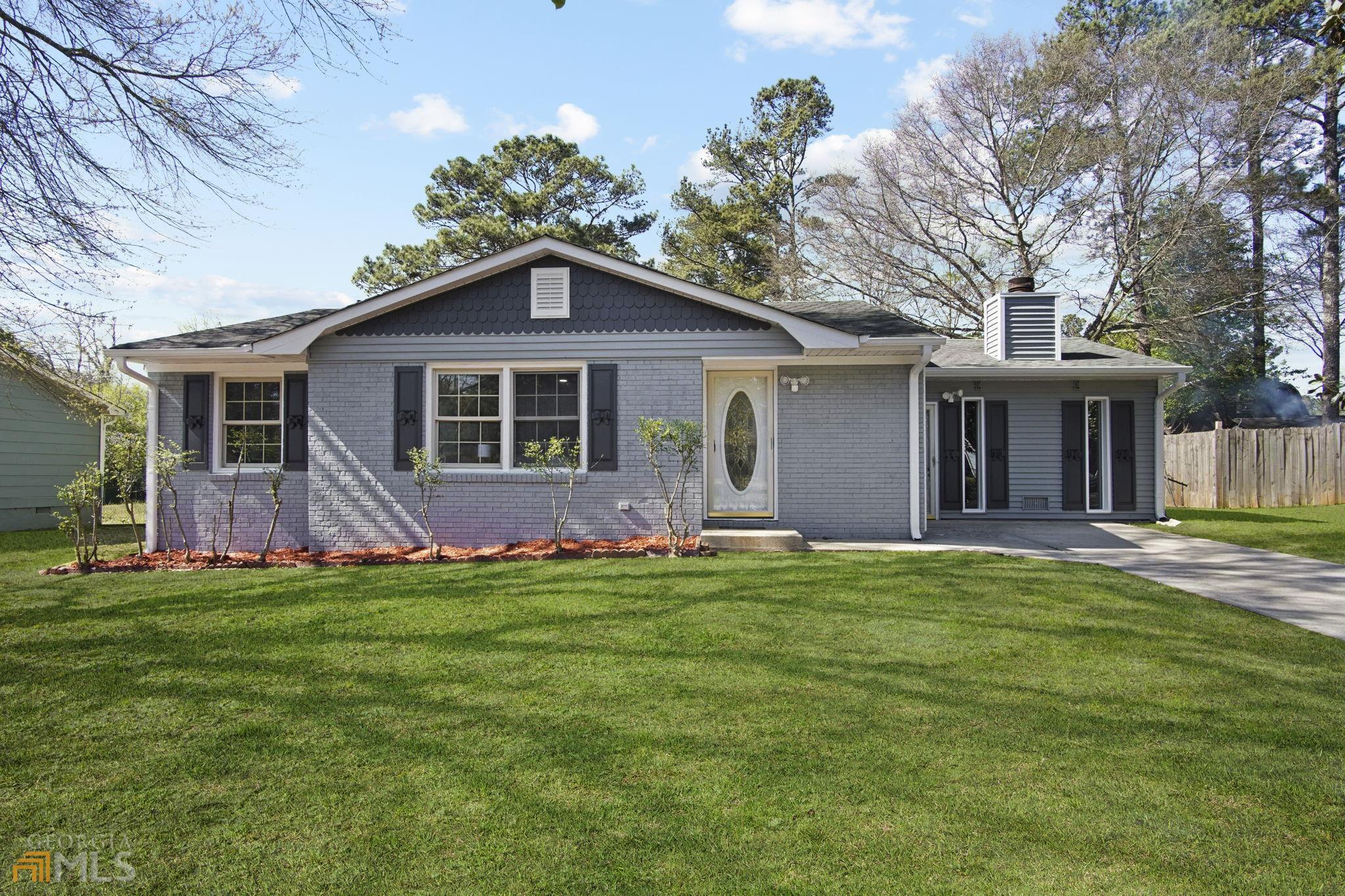 MOVE IN READY! This home is beautiful inside and out! Do not missed this gorgeously remodeled ranch style home with so much to give. This home offers a large open kitchen with tons of cabinet space, an island and granite countertops. Enjoy the ability to entertainment family and friends in the large living room and den. Relax in either of the two spa-like bathrooms. The large backyard is prefect for summertime fun.