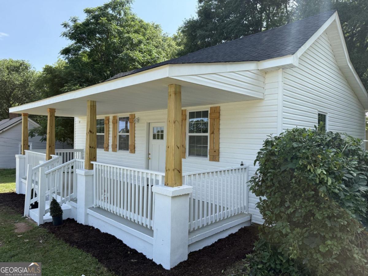 Priced To Sell. 100% completely rebuilt home in growing and historic Lagrange, Georgia. This corner home is located across the street from Callaway Memorial Tower and on the New Lagrange Thread Bike trails - minutes from restaurants and shops downtown. This home boasts 9ft ceilings, new roof, new patio and porch, new siding, insulated walls, floors, windows, doors, kitchen, bathroom, electrical, plumbing, ceilings, attic, water heater, appliances, and central heating/ac. Too much to list. This is currently a 1 bedroom home, the seller will give $7500 dollars cash back at closing for the new homeowner to pay for and add the 2nd bedroom, we built the structure / flooring for the 2nd bedroom, you can see it with the pictures provided, its ready to add a nice large 2nd bedroom to the back of this house, this is contingent on the buyer taking the house As Is' with no contingencies. If you decide to take the $7500 credit or cash back at closing, we can connect you with the person that remodeled this home that can build that 2nd bedroom for this budget. You will get 2 bedrooms for an amazing price.