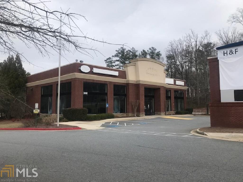 30,000 sq. ft. Commercial Building with 2+ acres fenced and additional 3 acres adjacent. Showroom / Warehouse / Office / Drive in doors For Sale or Lease Excellent location just 4 miles north of Barrett Parkway on Cobb Parkway. 30,000+ cars per day