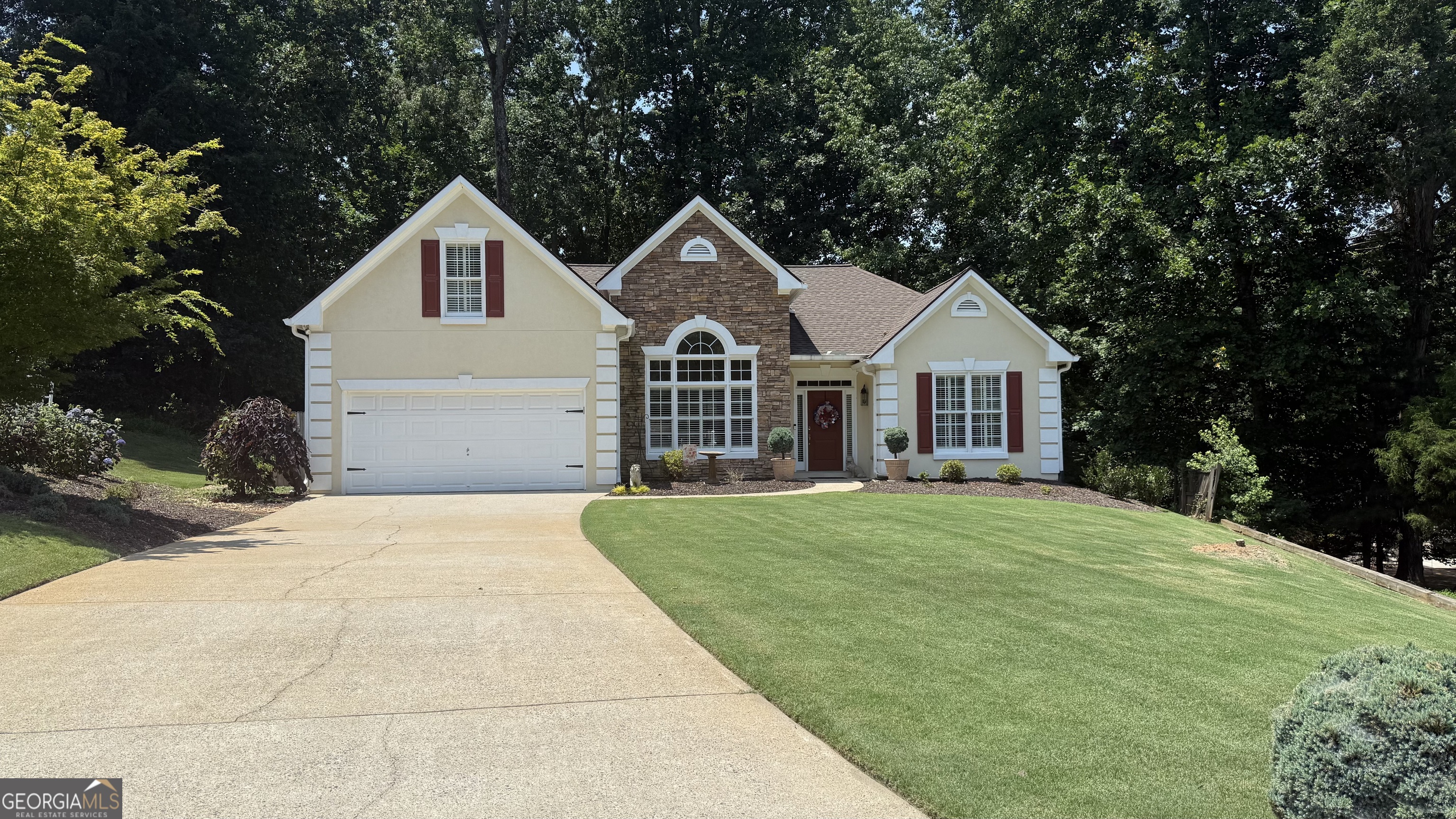 Just minutes from Lake Lanier, this beautifully upgraded ranch is a rare find in East Forsyth for only $500K. Set on a quiet cul-de-sac, the half-acre lot offers privacy and space. Inside, enjoy hardwood floors, stone countertops, high-end cabinets, quality appliances, and stylish finishes throughout. The open layout includes a formal sitting room and a flexible dining room or office. The split-bedroom design keeps the primary suite separate from the other bedrooms, and the upstairs loft adds a perfect bonus space for guests, work, or play. The backyard has room to customize. Neighborhood perks include resurfaced tennis and pickleball courts, a community pool, and direct lake access for fishing. You're just 5 minutes from Port Royale Marina, Pelican Pete's, and top-rated Forsyth County schools, including the new East Forsyth High. Quick access to GA 400 and Hwy 985, plus easy trips to Gainesville, Cumming, Dawsonville, and the North Georgia Premium Outlets. Ideal space for anyone wanting a one level home and or lake life without the lakefront price tag.