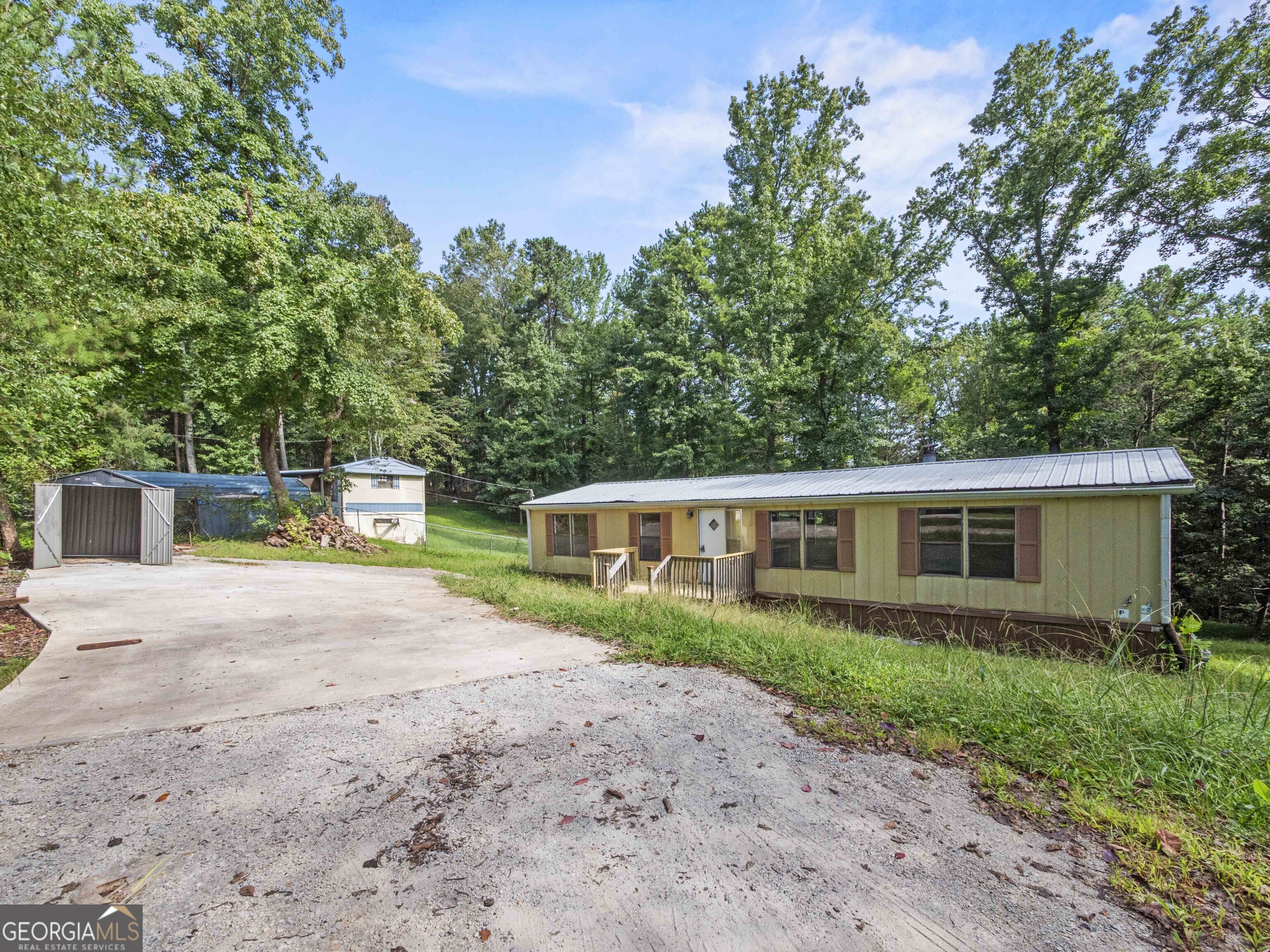 Move in ready mobile home. 3 bedrooms, 2 bath on over half an acre lot. No HOA
