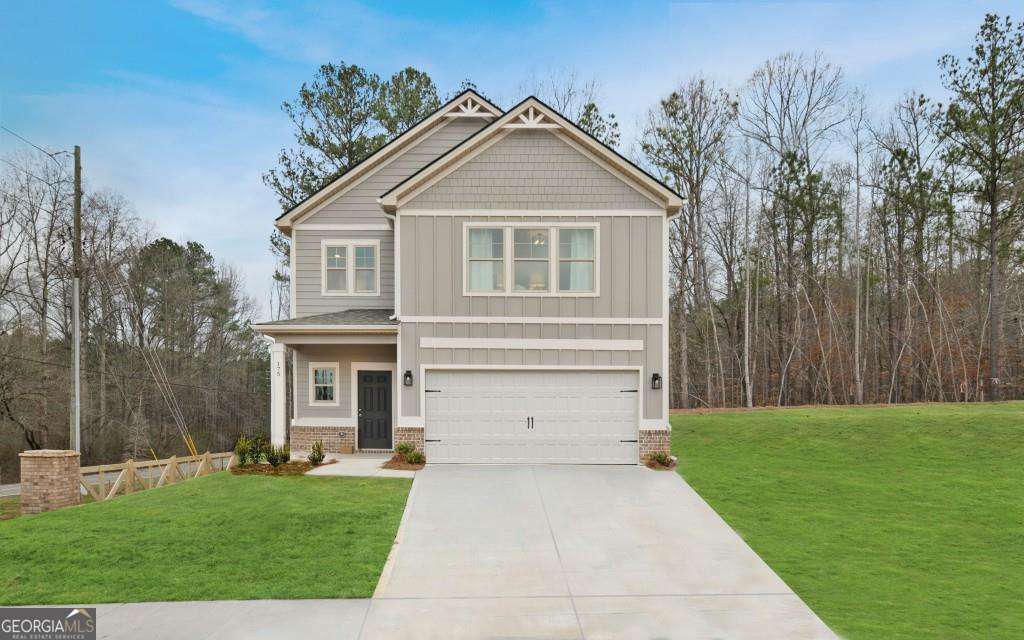 DRB Homes welcomes you to Homesite 123 in Chapel Hill, located in the sought-after Newnan, GA, known as "The City of Homes." No detail is left behind in this beautiful single-family home featuring an exquisite brick and Craftsman exterior. This spacious Zoey II floor plan offers 4 bedrooms and 3 full bathrooms with an open-concept family room and kitchen layout. The stunning kitchen boasts an expansive island with quartz countertops, a tile backsplash, soft-close cabinets, a spacious pantry, and stainless steel appliances, including an oven/cooktop, dishwasher, and microwave. A guest room and full bathroom are conveniently located on the main floor. Upstairs, the gorgeous owner's suite features an elegant sitting room, a vaulted ceiling, and a luxurious owner's bathroom with a shower and separate soaking tub. The centrally located laundry room serves the upstairs bedrooms for added convenience. This home includes gutters on all sides, blinds on every window, a garage door opener, quartz countertops in the kitchen and all baths, a garbage disposal, and soaring 9-foot ceilings on the main level. Interior photos and virtual tours are of a decorated model or spec home. Come see the DRB difference and tour our beautiful model home today! Please note: If the buyer is represented by a broker/agent, DRB REQUIRES the buyer's broker/agent to be present during the initial meeting with DRB's sales personnel to ensure proper representation.