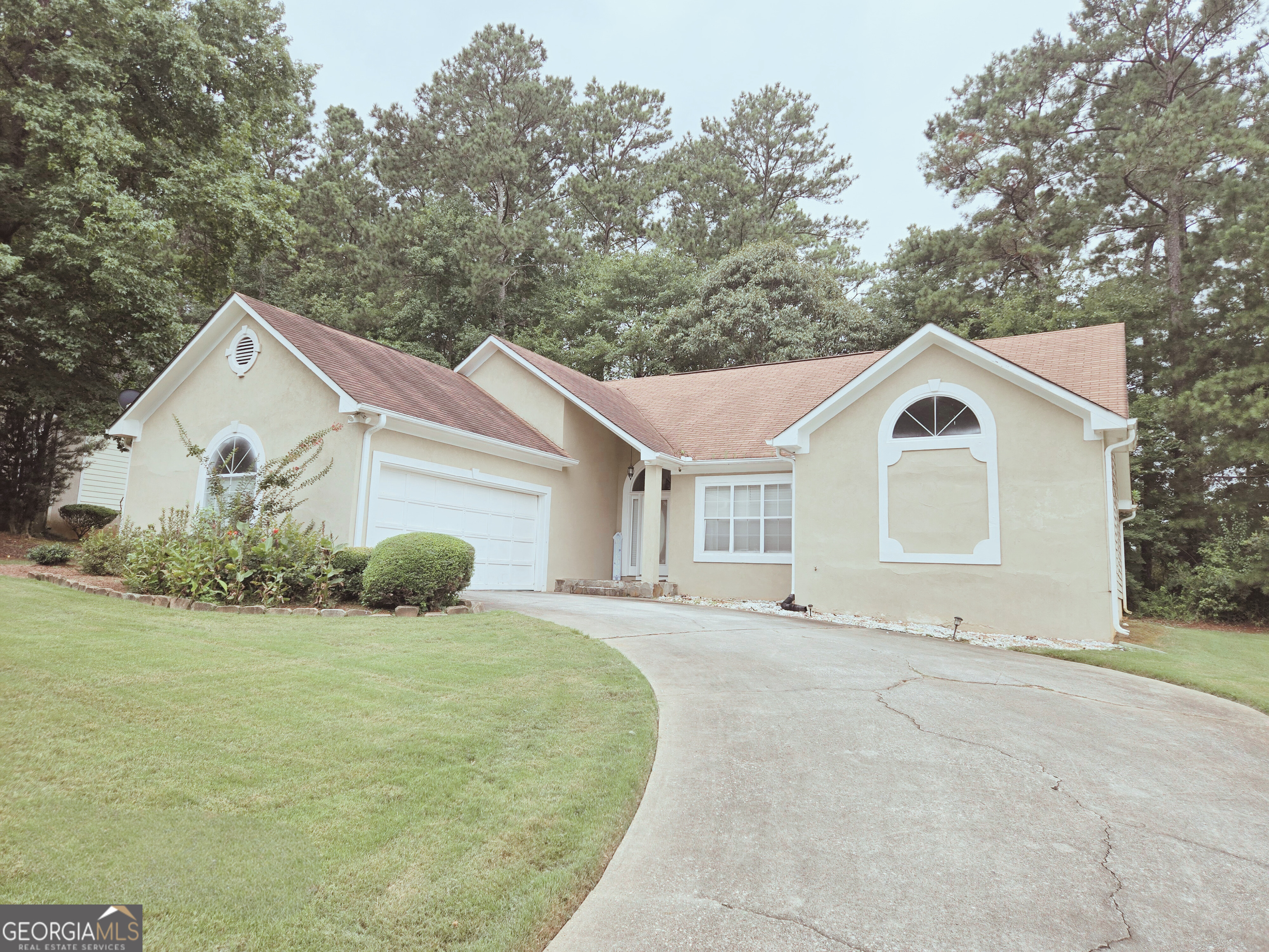 Come see this beautiful one-story ranch that's full of charm! The large family room is perfect for movie nights or relaxing together. There's a separate dining room where you can enjoy meals with family and friends. The kitchen has beautiful cabinets, a breakfast bar, and a breakfast area. You'll love the owner's suite, with 2 walk-in closets, a garden tub, and a separate shower. It also has its own cozy sitting area-a perfect spot to relax or read a book. Step outside to a huge backyard with room to play, garden, or host a BBQ. This home has everything you need-and more!