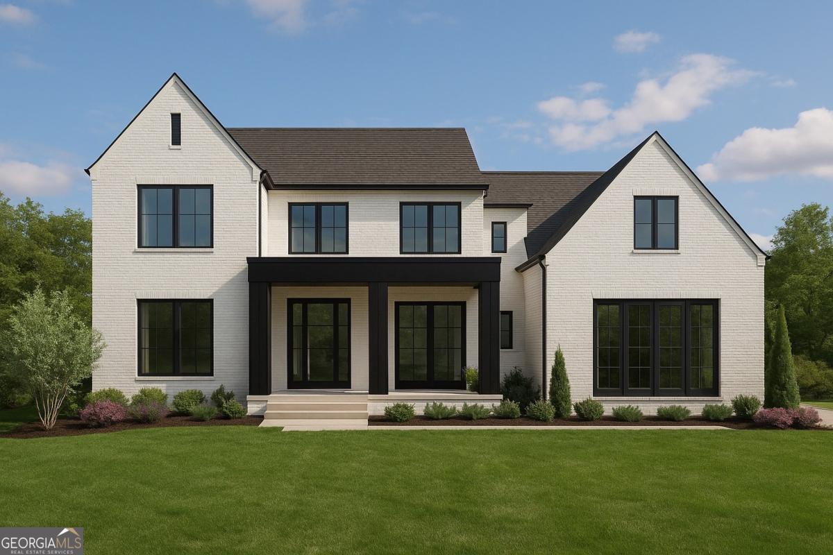 Modern Sophistication Meets Timeless Elegance in this Architectural Masterpiece. Two-minute walk to Wills Park. Six-minute drive to Downtown Alpharetta, The Avalon & more! Step into unparalleled luxury with this newly constructed, 6-bedroom, 5-bathroom modern European-inspired estate, where refined design and everyday comfort seamlessly intertwine. From the moment you arrive, the striking white brick facade, sleek black window trim, and dramatic covered entryway set the tone for the architectural brilliance that awaits inside. As you enter the soaring two-story foyer, you're greeted by a show-stopping curved staircase illuminated by modern sconces, setting the tone for a home that exudes elegance at every turn. The open floor plan is drenched in natural light, complemented by wide-plank hardwood floors and clean, elevated finishes throughout. The main living area boasts dramatic 2-story ceiling heights, a sculptural modern fireplace flanked by arched built-ins, and expansive windows offering panoramic views of the lush, tree-lined backyard. Whether you're entertaining or simply relaxing, the ambiance is both grand and grounded. The gourmet kitchen is a chef's dream, equipped with sleek custom cabinetry, double ovens, and a spacious 10ft center waterfall edge island, perfect for casual dining or evening cocktails. Every element is meticulously designed for form and function. With 2 primary suites, retreat to your private sanctuary of choice in the either of the spa-like primary baths, where an oversized soaking tub, soft tile accents, and brushed gold fixtures create the perfect space to unwind. The custom walk-in closet is outfitted with boutique-style built-ins, glass doors, and integrated lighting tailored for the most discerning wardrobe. For those who prioritize space and functionality, this home is a perfect fit. With 2 primary suites, 2 laundry rooms and even 2 culinary prepping areas, you'll never run out of options. There's even a spacious bonus area above the garage that can be used as a guest room, media room, play room or a personal gym with ample space for your fitness routine. Disclaimers: The home is currently under construction with an estimated completion date of Sept./Oct. All floor plans, renderings and dimensions are approximate and may differ from final construction. Pricing and plans are subject to change without notice. Measurements, built-in features, furnishings, and finishes depicted are for illustrative purposes only and may not reflect the final product.