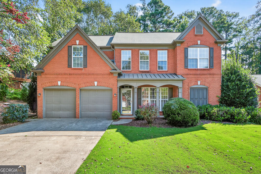 Welcome to relaxed luxury living in sought-after Longlake, one of Forsyth County's premier communities! From the moment you arrive, the beautifully treed entry and lush, professionally landscaped grounds set the tone for this vibrant and active neighborhood. Residents enjoy a stunning 45-acre stocked lake for fishing and non-motorized boating, resort-style swimming pools, ALTA tennis teams, pickleball courts, basketball court, a beautifully maintained playground, and a gorgeous clubhouse - all designed to support an exceptional lifestyle. This move-in ready home is nestled in a special section of Longlake where ground maintenance is included, offering low-maintenance luxury with all the benefits of a single-family home. Sellers recently enhanced the home with fresh interior paint, new carpet and luxury flooring, updated fixtures, and more - creating the perfect blend of timeless design and modern comfort for today's discerning buyer. As you step inside, you're welcomed by a bright and spacious formal dining room just off the foyer, perfect for hosting gatherings. Beyond the foyer, the open-concept living room/family room features a beautiful fireplace and flows seamlessly into the heart of the home - the gourmet kitchen. The kitchen impresses with a spacious center island, granite countertops, a designated casual dining area overlooking the private backyard, and newly installed top-of-the-line stainless steel appliances including a wall oven, wall microwave, gas cooktop, refrigerator, and dishwasher. Whether cooking or entertaining, this kitchen delivers both form and function. The entire main level is finished in show-stopping luxury vinyl plank flooring, offering durability and beauty. The primary bedroom suite is conveniently located on the main level and features double vanities, a separate soaking tub and shower, a generous walk-in closet, and newly installed vinyl marble tile flooring in the en-suite bath. Upstairs, you'll find two additional bedrooms and a large open loft - the perfect bonus space for a family room, office, game area, or flex space to fit your lifestyle. The upper level is finished with luxury carpeting for comfort and warmth. There's also walk-in attic storage for added convenience. Step outside to your private, fenced backyard oasis. Recent tree trimming and perimeter clearing allow more sunshine to filter in, while the property extends beyond the fence line into private woods where deer are occasionally spotted and the trees provide a peaceful, natural retreat. It's a truly magnificent backyard with the space and privacy to relax or entertain. Enjoy the charm of a covered front porch, a brick exterior, abundant natural light throughout, and timeless curb appeal - all just minutes from GA 400, top-rated schools, greenways, parks, shopping, and dining. Don't miss this rare opportunity to enjoy luxury, low-maintenance living in an amenity-rich, lakefront community. Welcome home to Longlake!