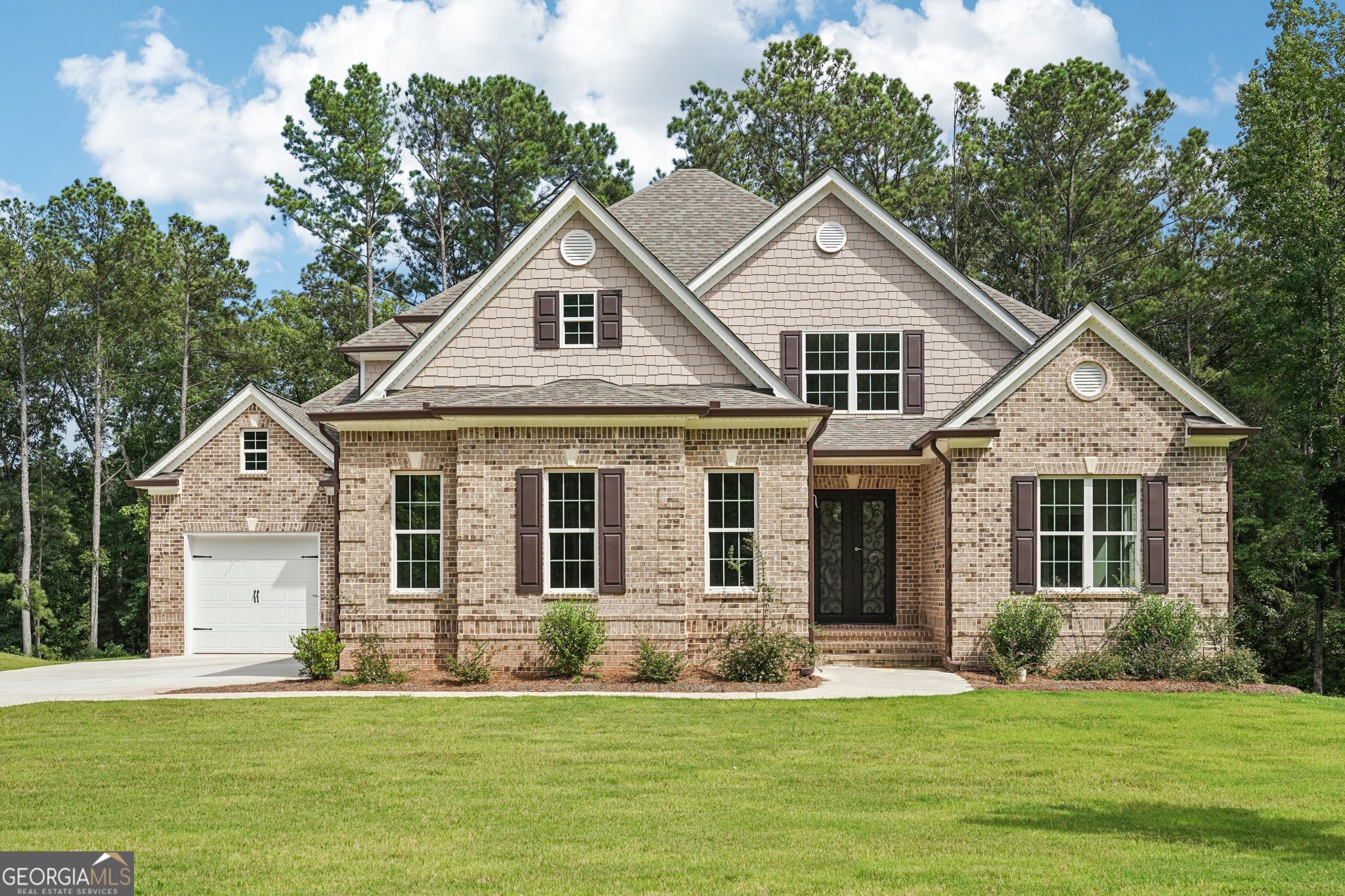 Special Financing Available Lock in a fixed 4.99 percent interest rate with preferred lenders or receive up to $15,000 in builder incentives, with additional savings available through our preferred lender network. The Layla Floor Plan offers 4 bedrooms, 4.5 baths, a massive open loft, and a large bonus room that can easily convert to a fifth bedroom. This home also includes a 2,432 square foot unfinished basement, stubbed for plumbing and ready for your vision, whether that is a home theater, gym, or guest suite. This home is ready for you to make the final design selections. Work closely with our team to personalize the finishes to your style and bring your dream home to life. Perfectly situated next to protected green space for added privacy and featuring two separate front entrances. The dramatic two story family room includes a gas fireplace framed by custom built-in bookcases. The gourmet kitchen is designed to accommodate a nine foot island or larger, making it ideal for both everyday living and entertaining. The main level primary suite features tray ceilings, hardwood floors, a spa-inspired bath, and a walk-in closet. A second bedroom with full bath is also on the main level. Upstairs includes two bedrooms, two full baths, the open loft, and the bonus room. Enjoy a covered back deck with stairs overlooking a spacious and leveled backyard. Located in a swim and tennis community with clubhouse and playground just 20 minutes from Interstate 20 with convenient access to Atlanta, shopping, and the airport. Proudly built by Hadi Builders, your trusted local custom homebuilder in Douglasville. Choose your lot, customize your finishes, or bring your own plans. We are here to help you create a home that fits your vision and lifestyle.
