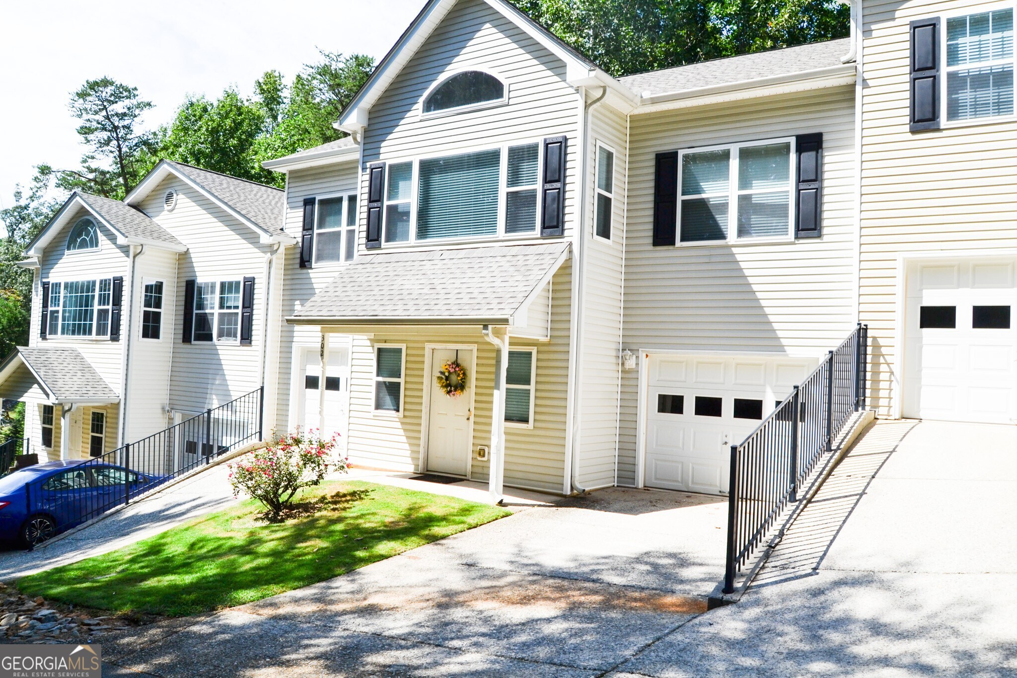 Spacious Town home with 2 oversized garages, private parking two mile from downtown Dahlonega. Roomate design with two masters new hardwood floors and a new roof. The main level has a large bonus/rec room for entertaining or home business. Convenience to the University, wine country of North Georgia and endless recreation in a roomy comfortable home.