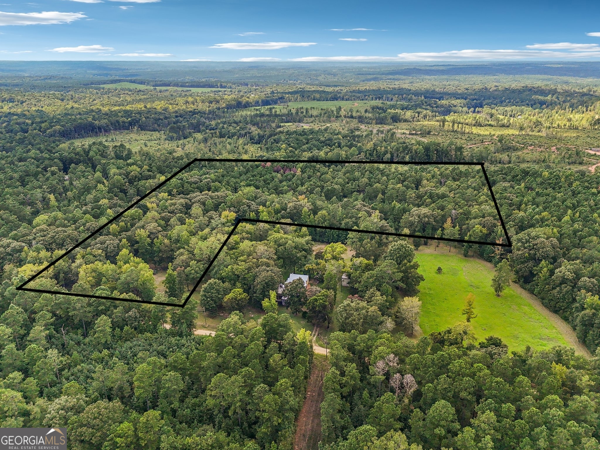 Escape to the quiet beauty of this 15-acre land lot featuring a blend of mature pines and hardwoods. This private setting offers endless opportunities-whether you're looking to build your dream home, create a recreational retreat, or invest in land for the future. The property is unimproved, giving you the freedom to design and develop it exactly how you want. With abundant trees, natural surroundings, and plenty of room to roam, this land provides the perfect balance of seclusion and potential.